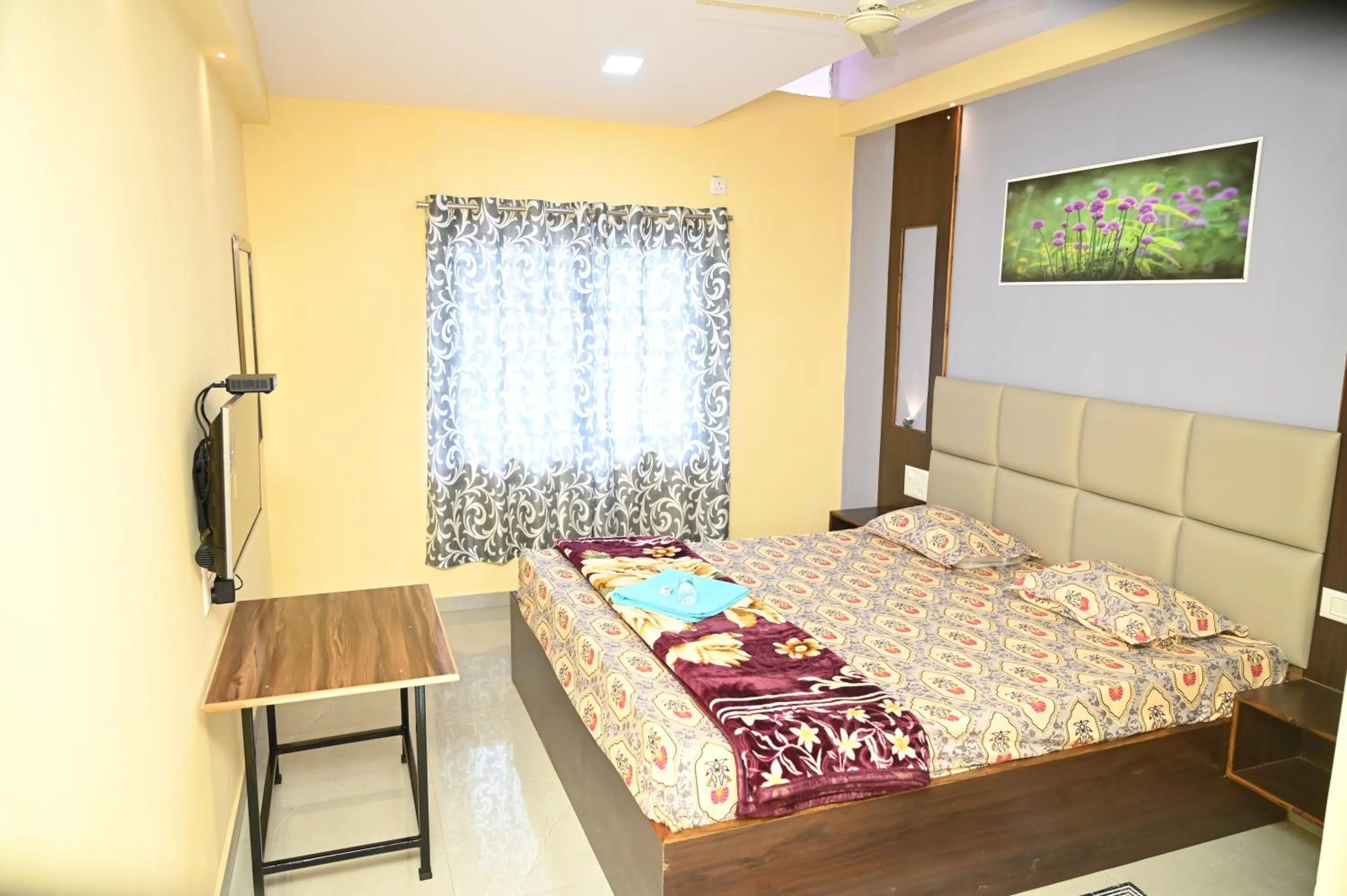 Bed in Hotel Nakshatra Resort