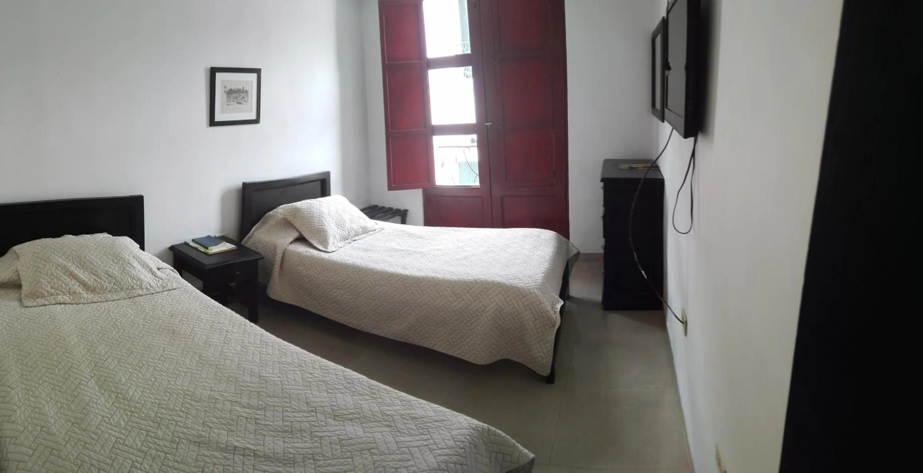 Bed in Hotel Popayan Plaza