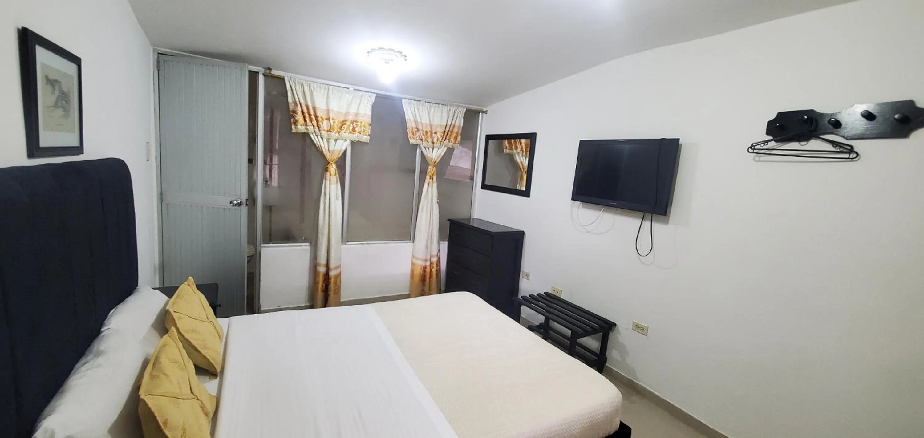 Bed in Hotel Popayan Plaza