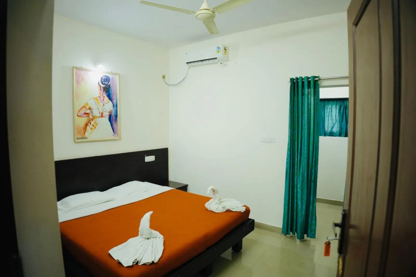 Photo of the whole room, Bed in Padmatheertham Inn