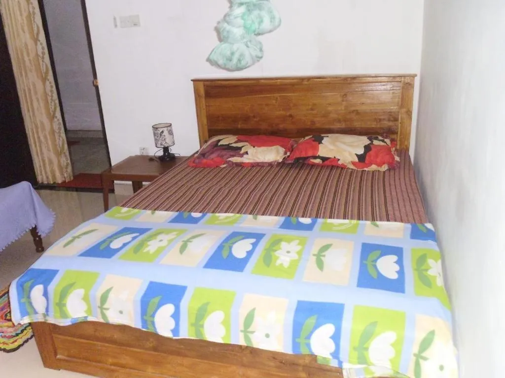 Bed in Indusara Villa Bentota