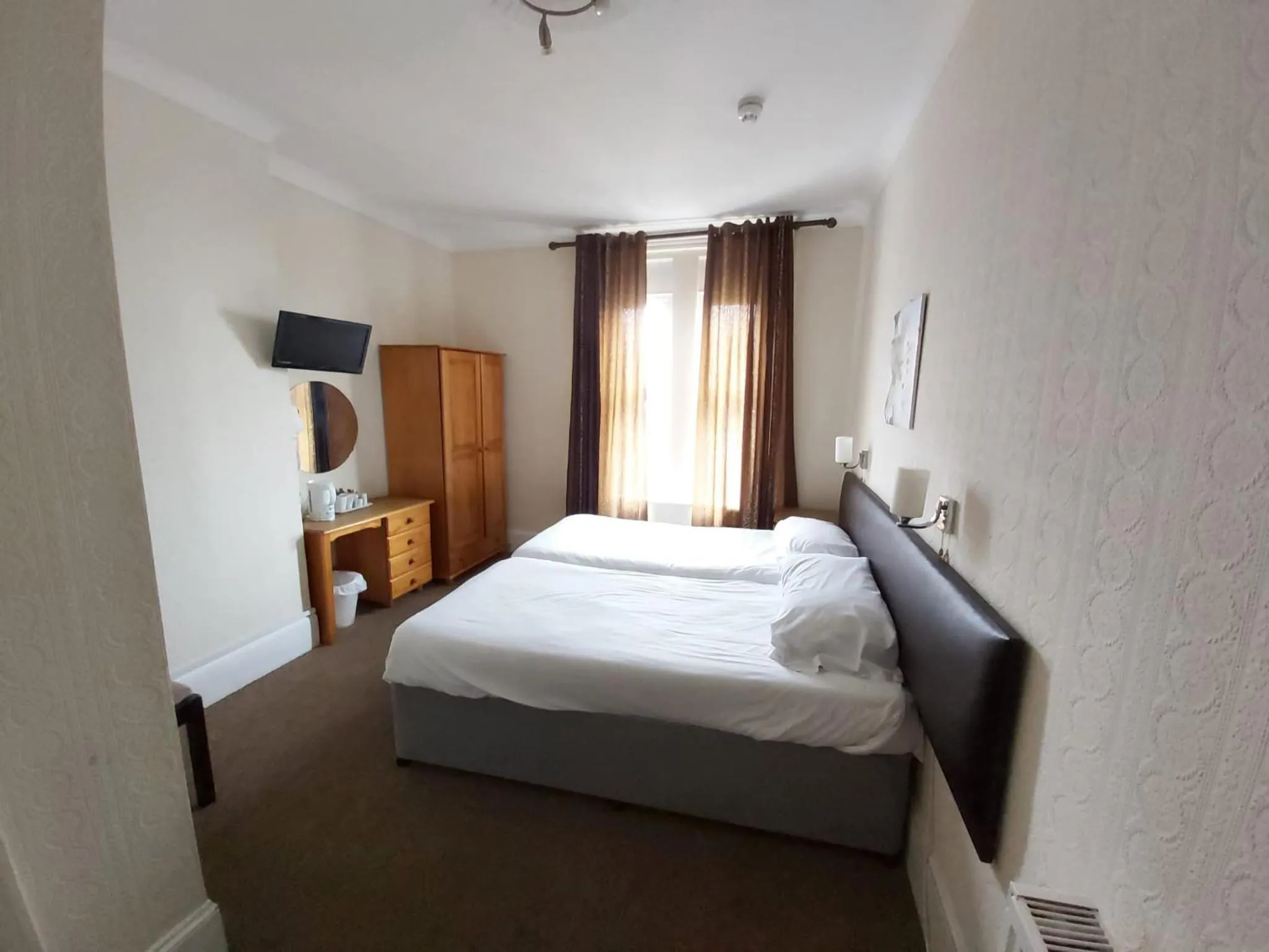 Bedroom in Channel View Hotel