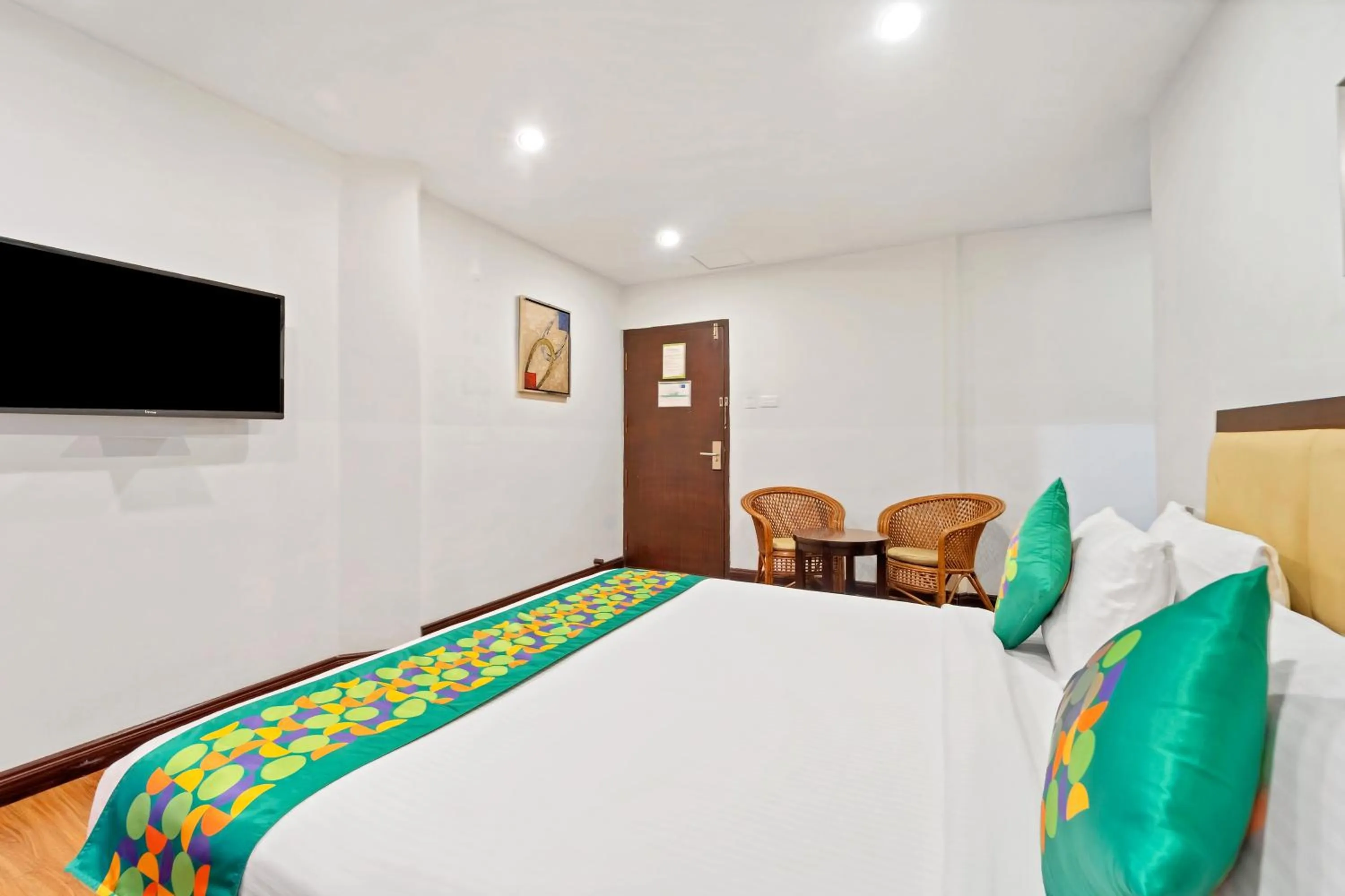 Bedroom, Bed in Treebo Adrak