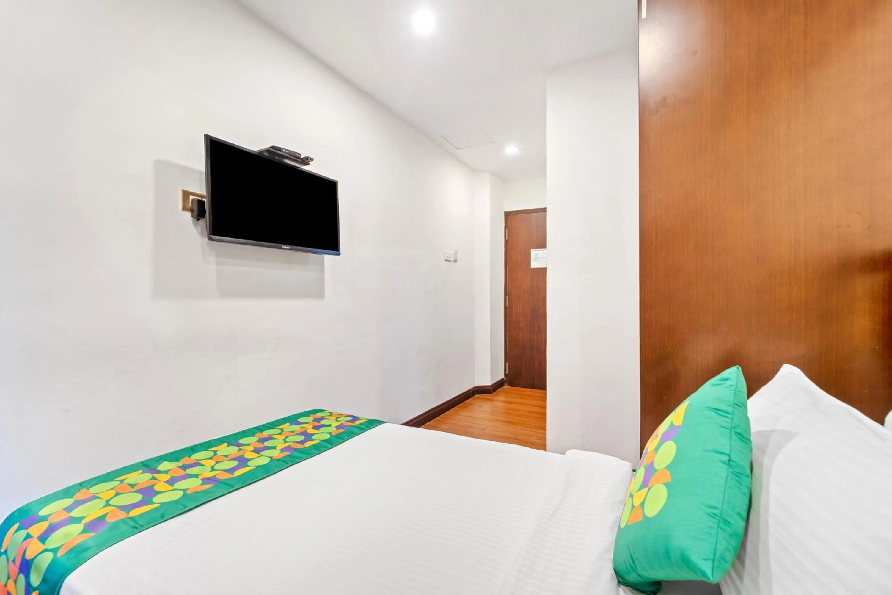 Bedroom, Bed in Treebo Adrak