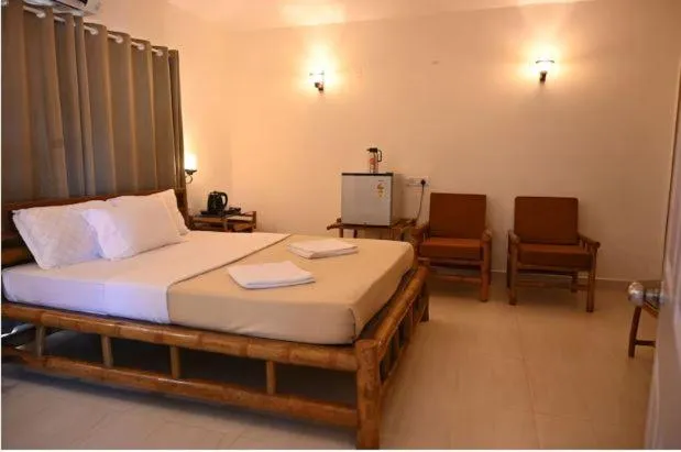 Bed in Shilpgram Heritage Resort