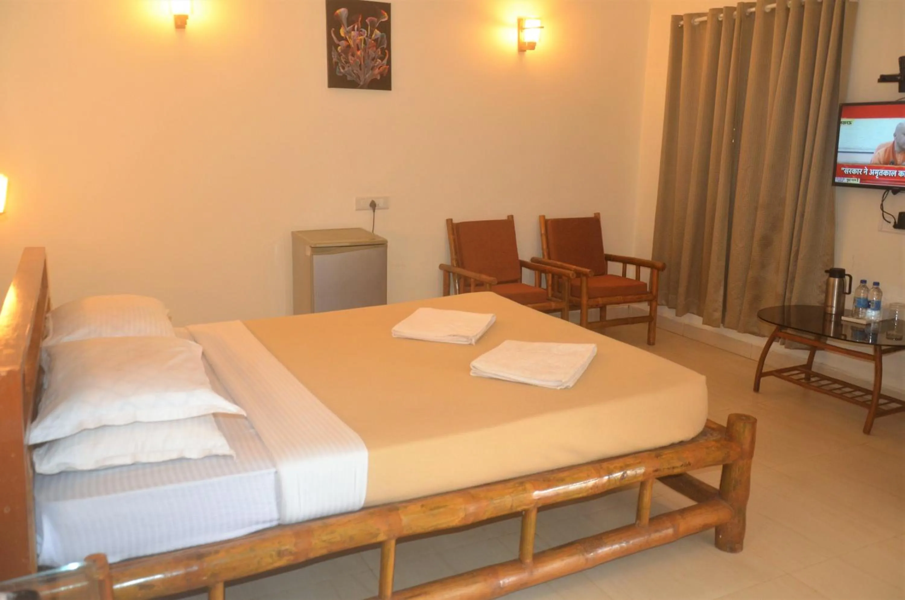 Bed in Shilpgram Heritage Resort