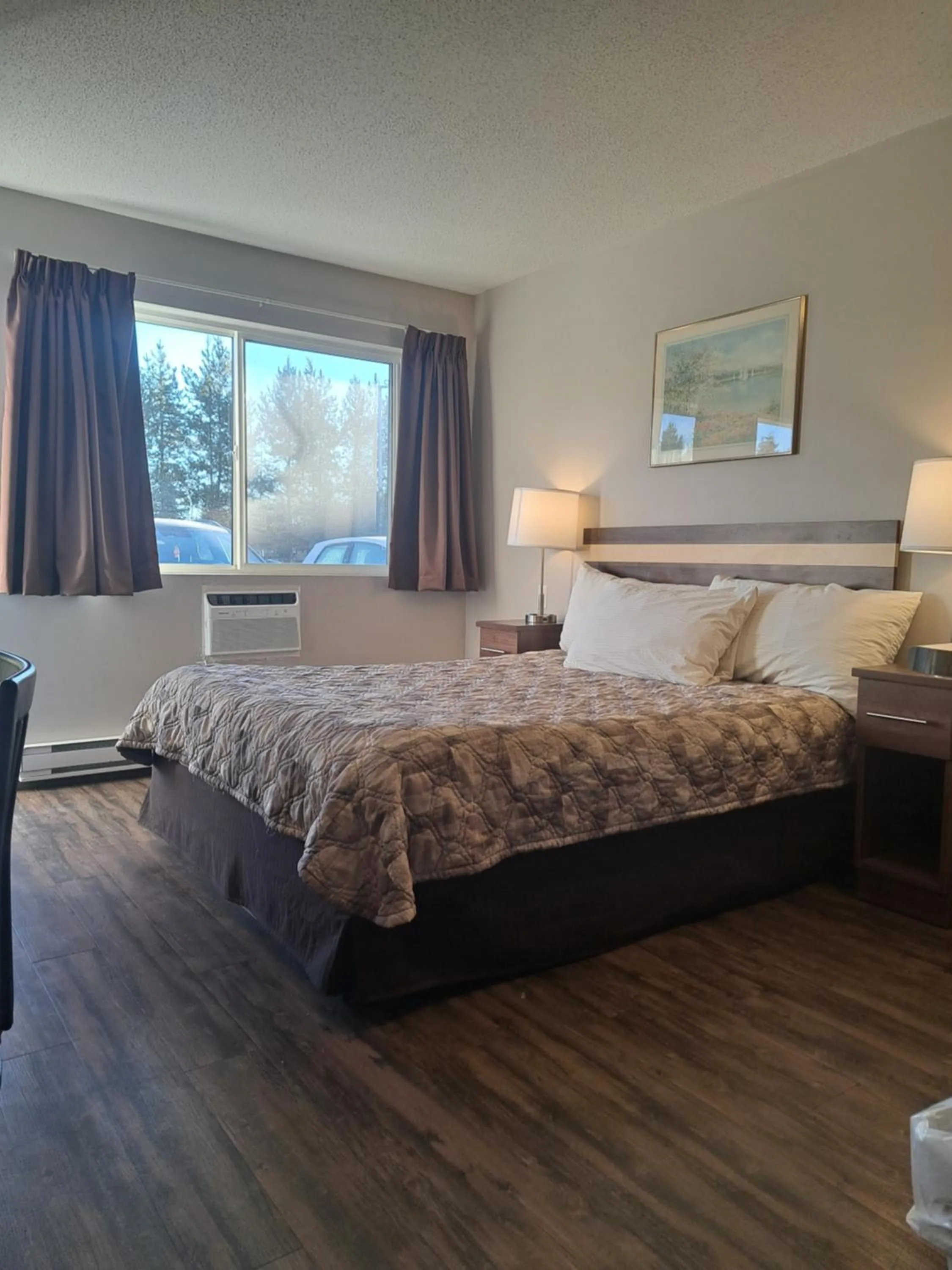 Bed in Bon Voyage Inn