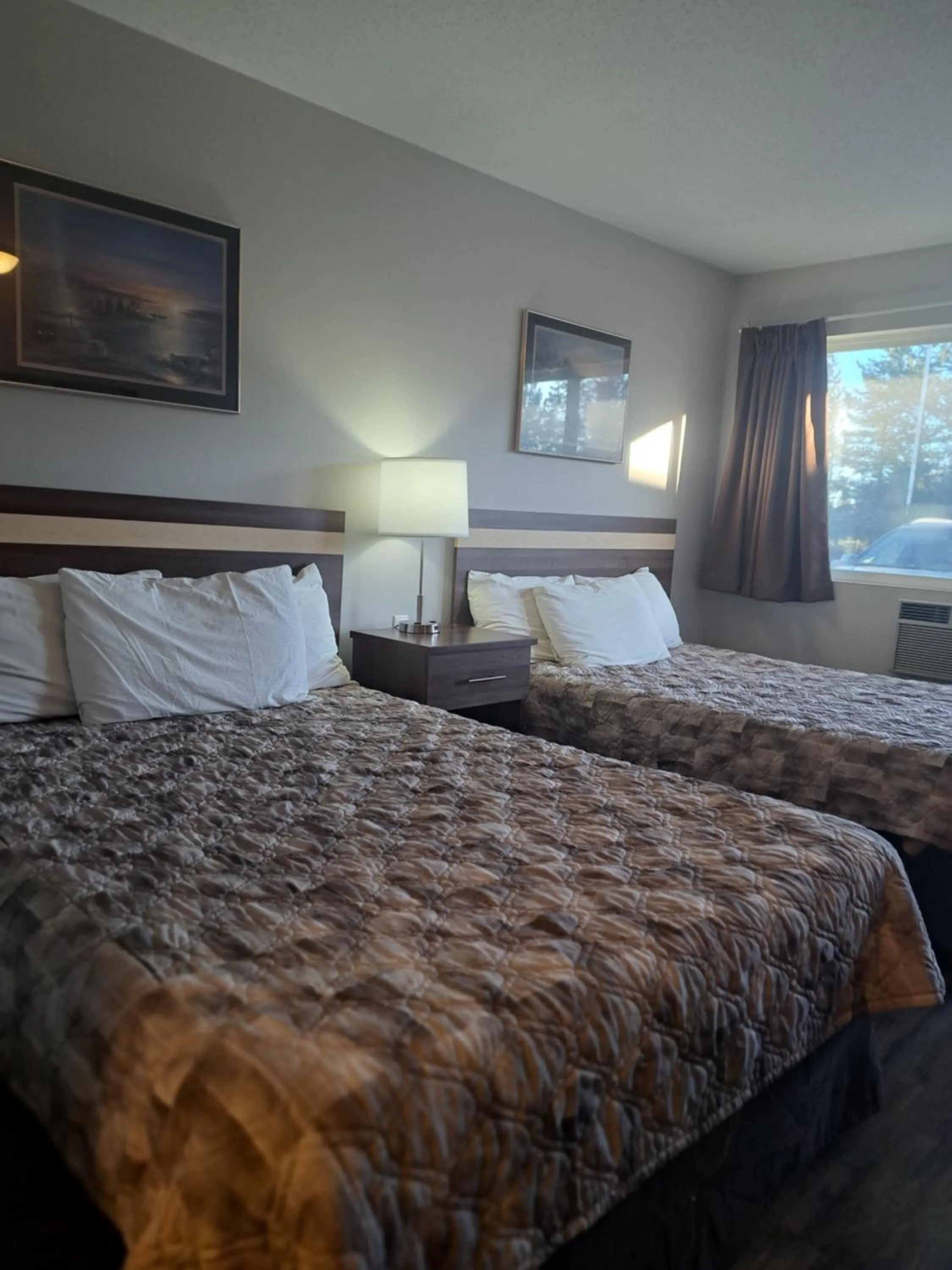 Bed in Bon Voyage Inn