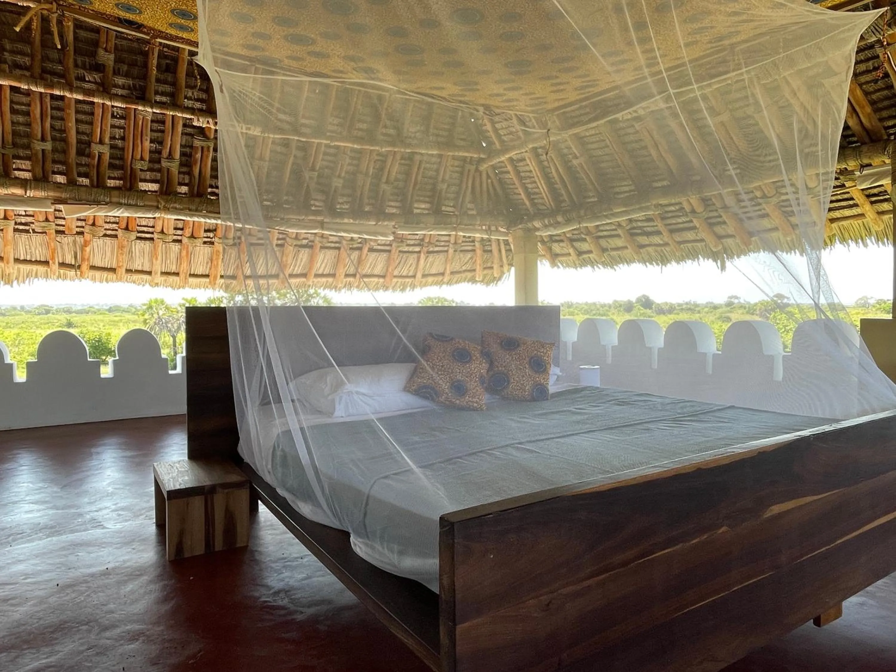 Bed in Pangani Cliffs Lodge