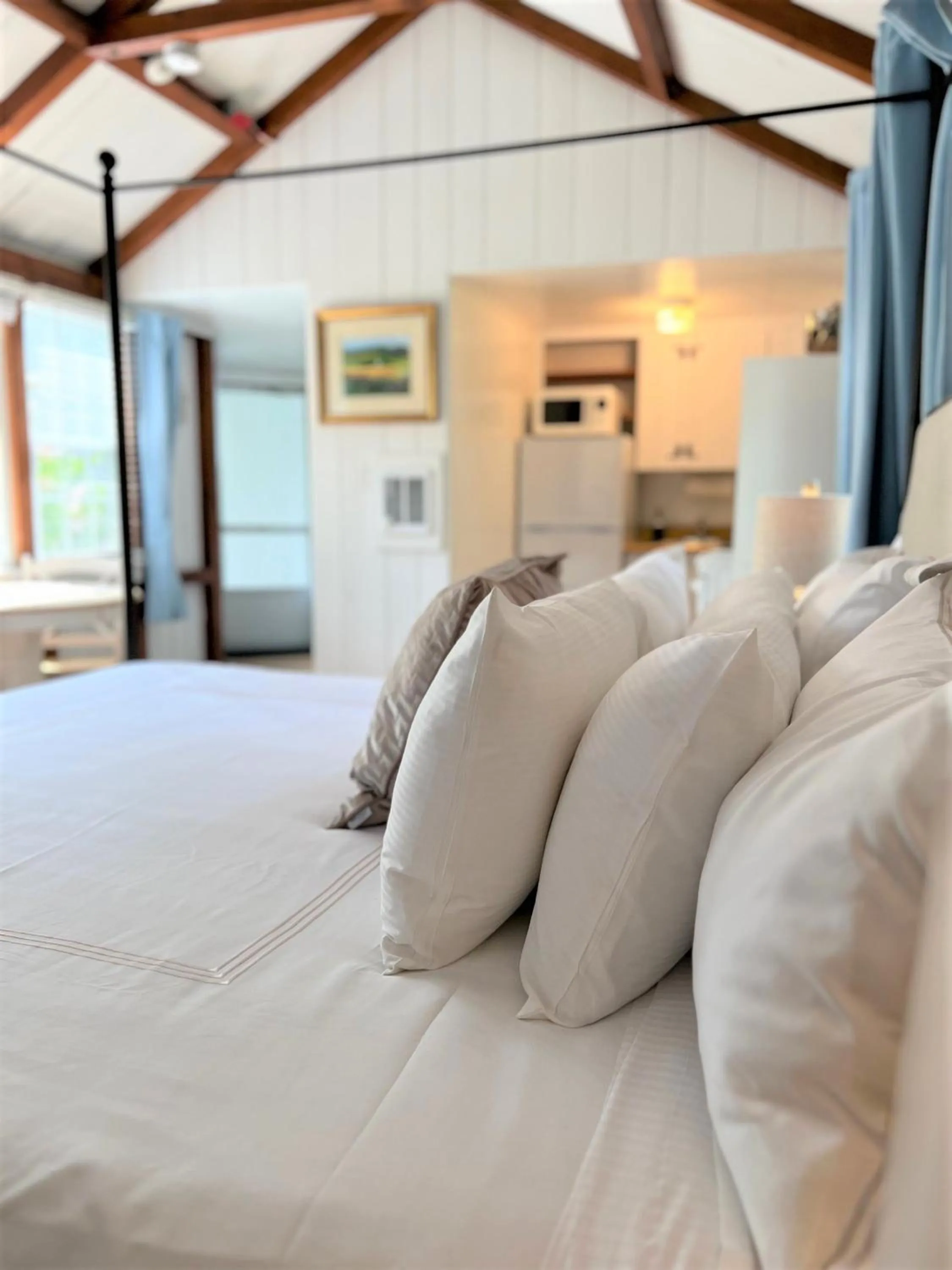 Bed in The Seagrove Suites & Guest Rooms