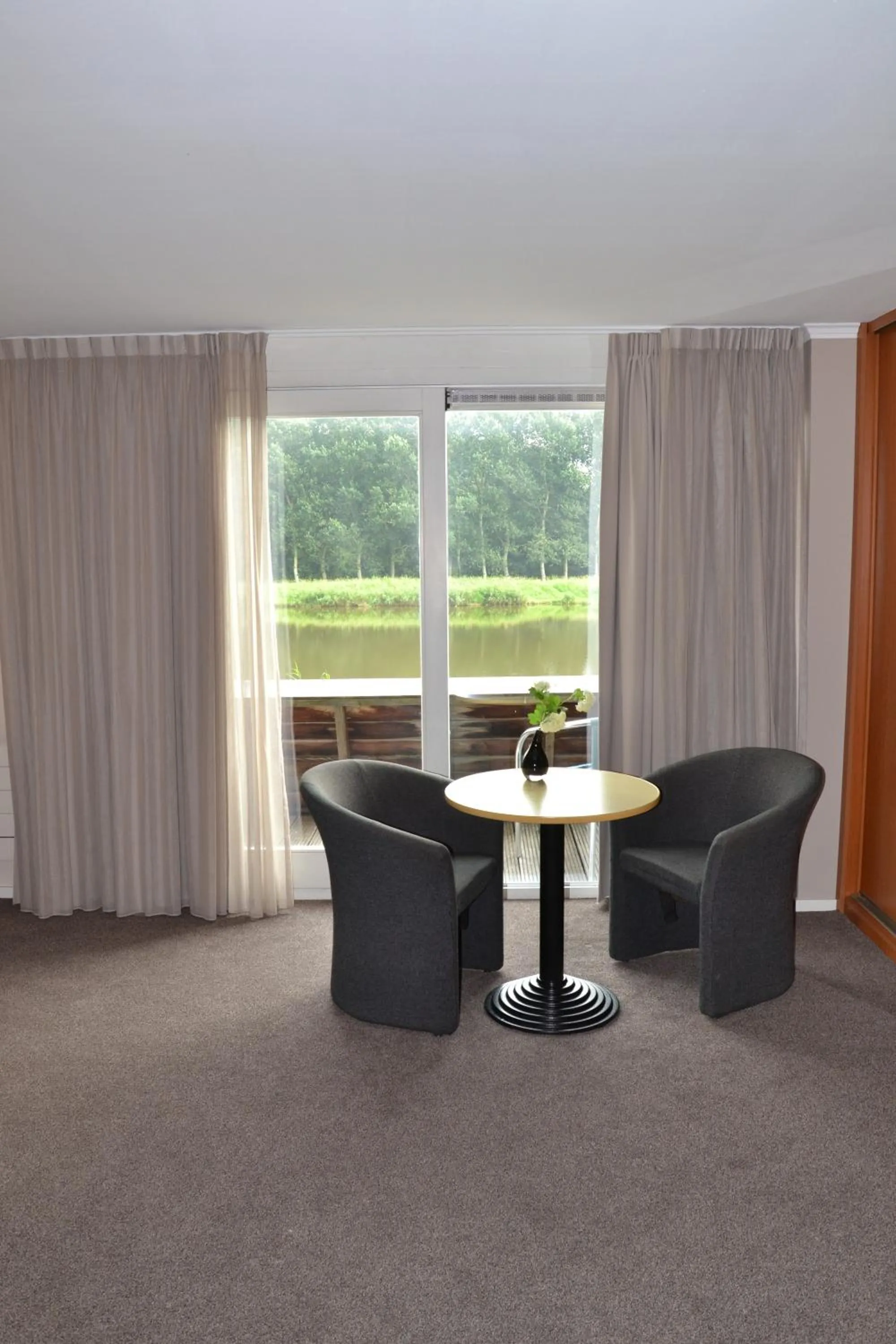 Seating area in Fletcher Hotel - Resort Spaarnwoude