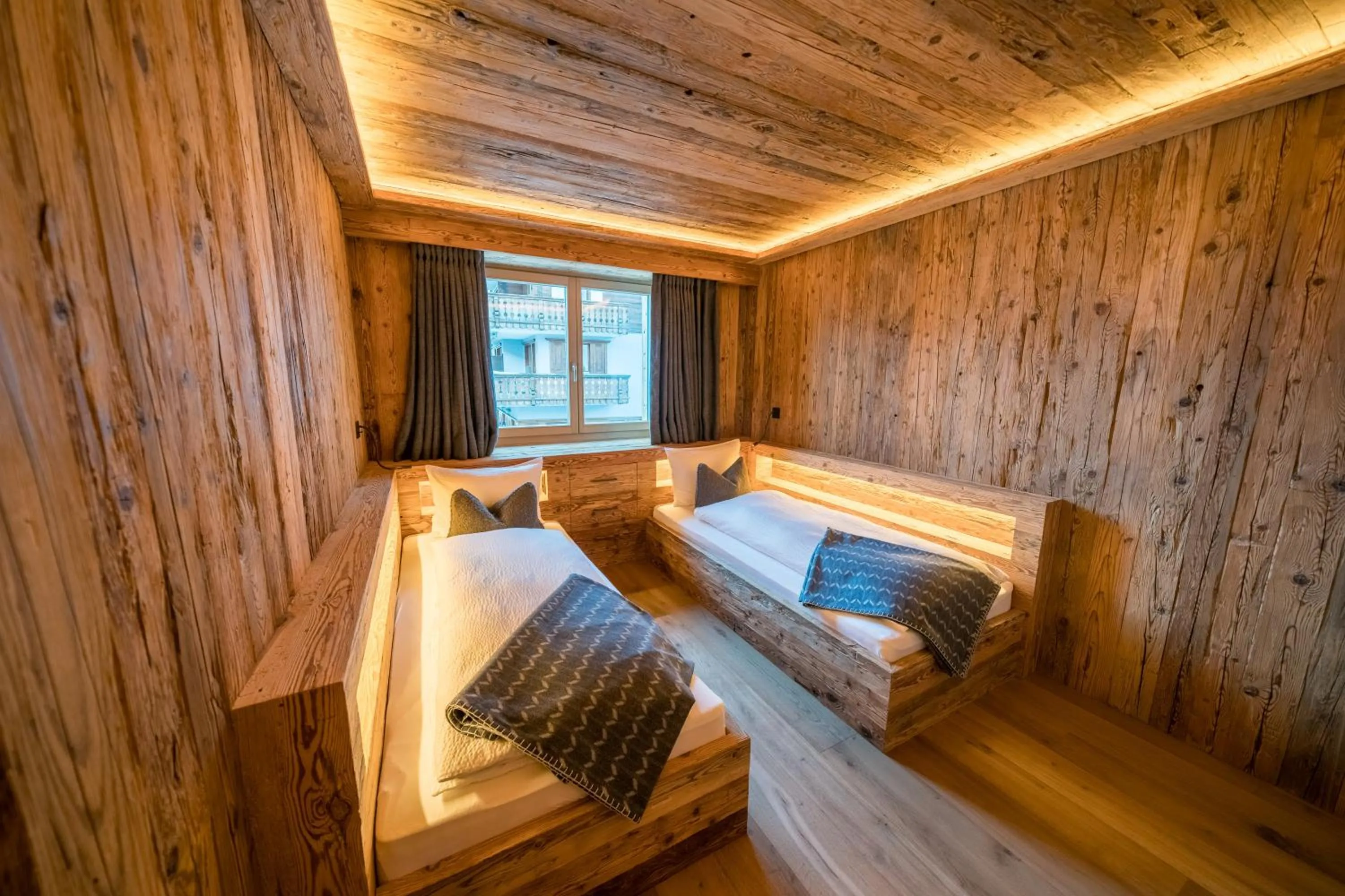 Bed in Seven Alpina Boutique Hotel