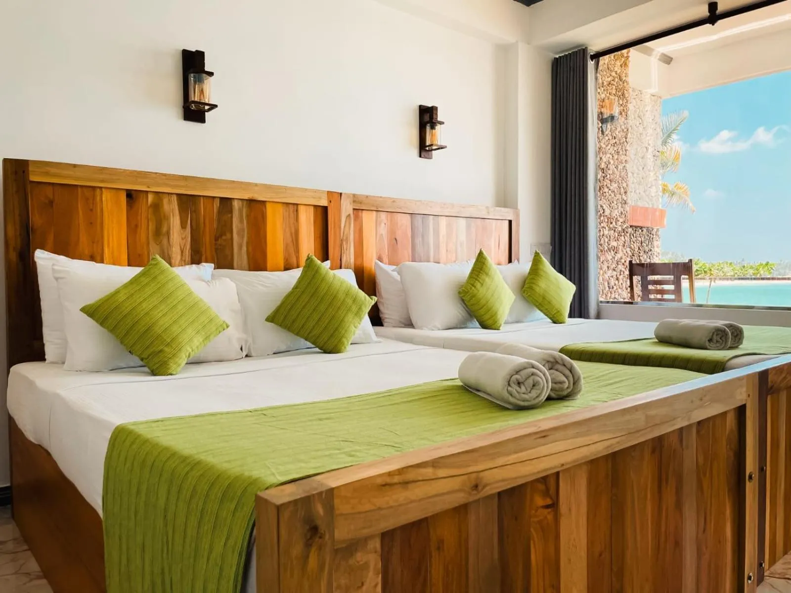 Bed in Coral Beach Hotel