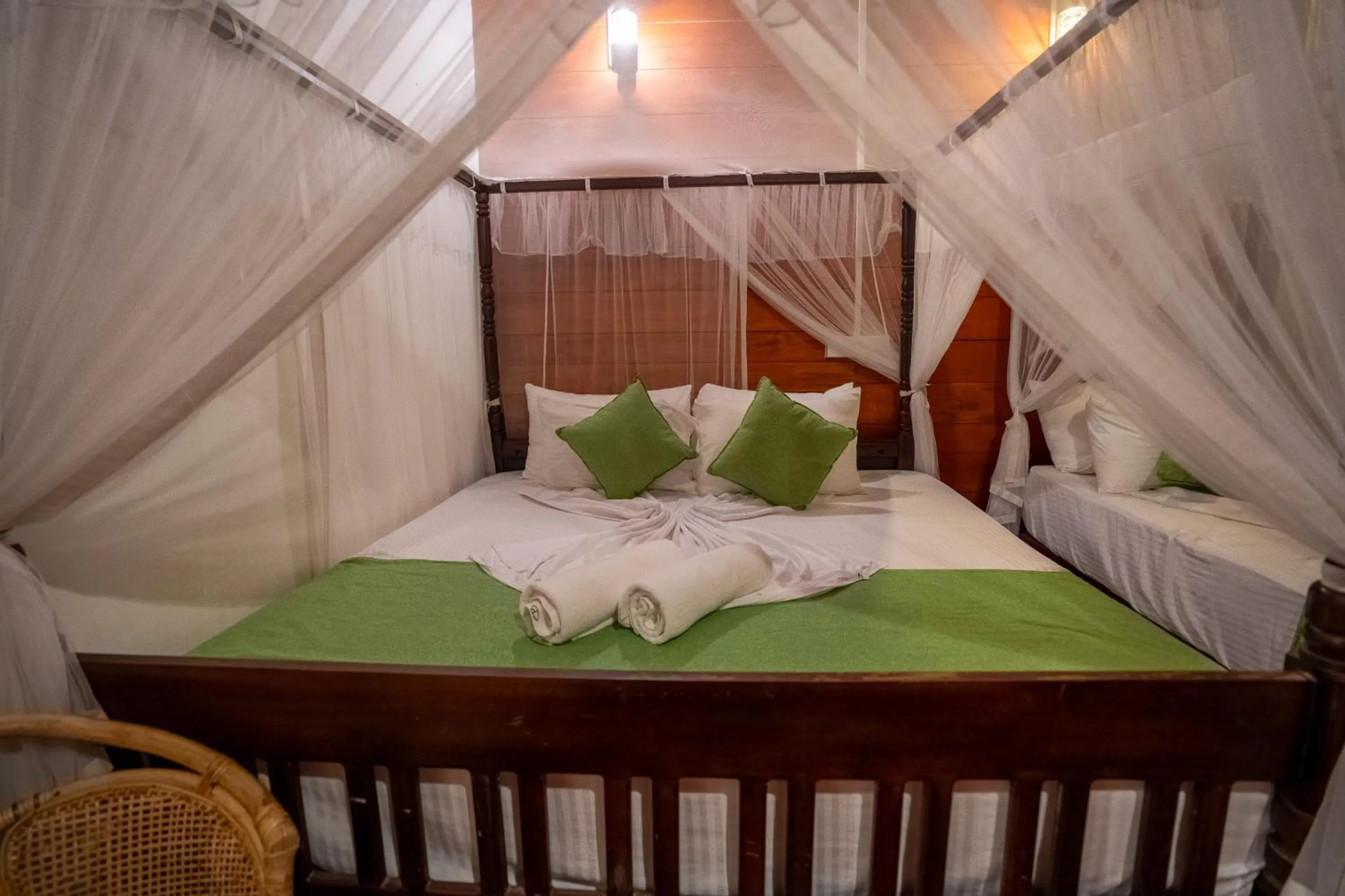 Bed in Coral Beach Hotel