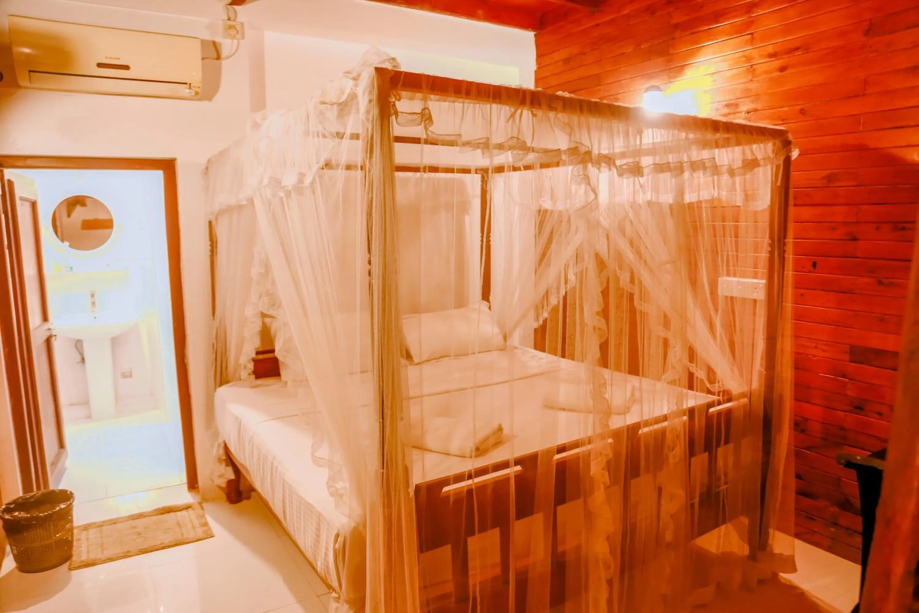 Bed in Coral Beach Hotel