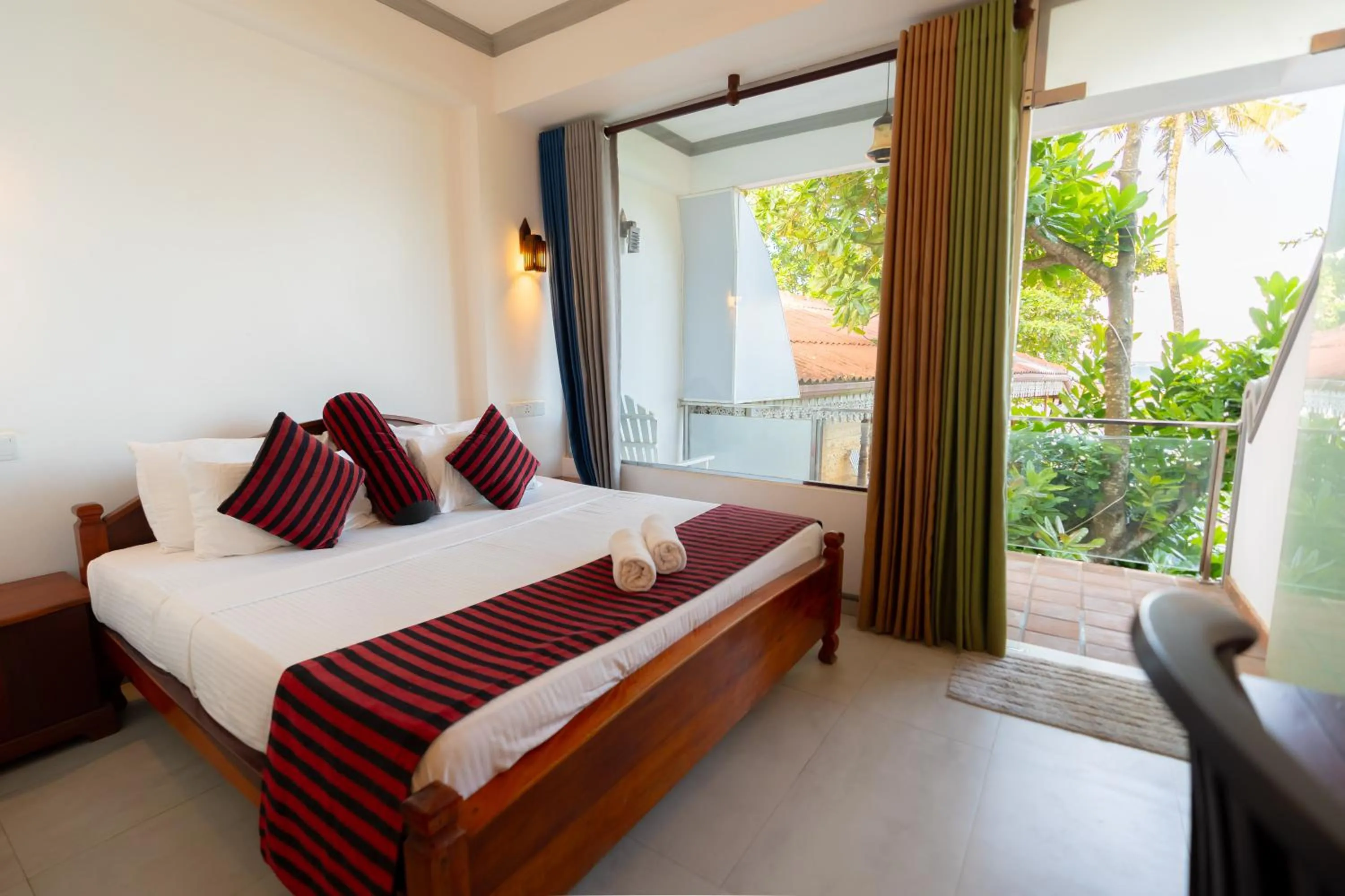 Bed in Coral Beach Hotel