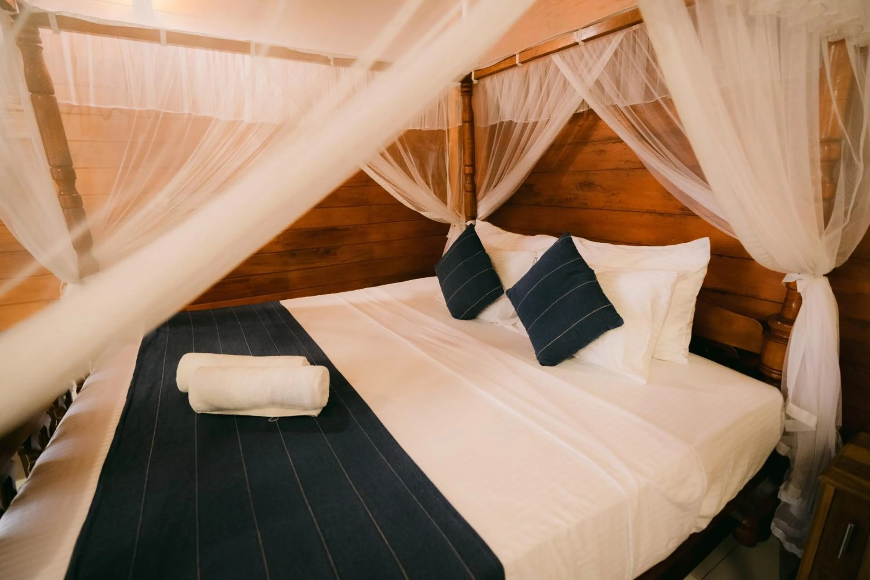 Bed in Coral Beach Hotel