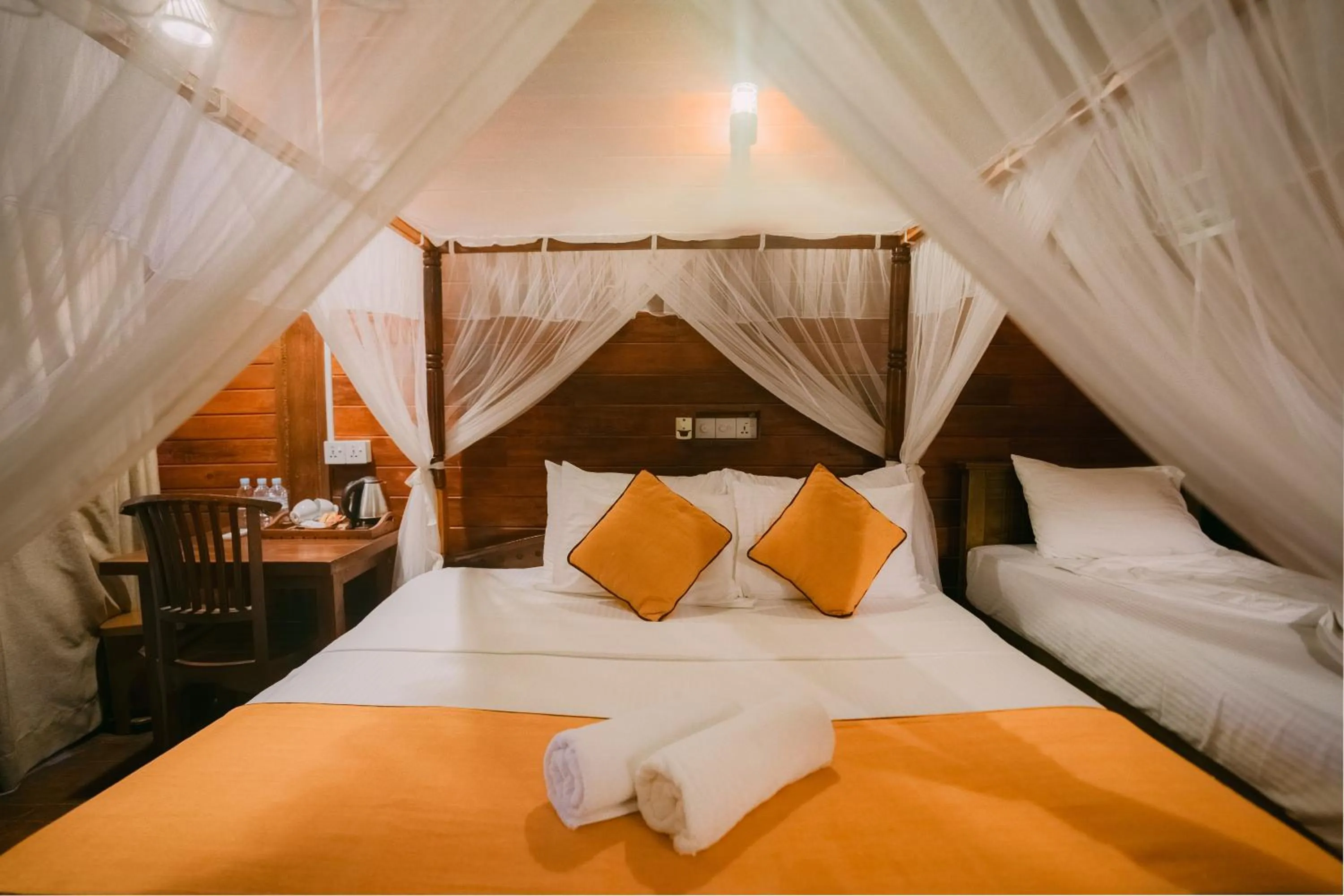 Bed in Coral Beach Hotel