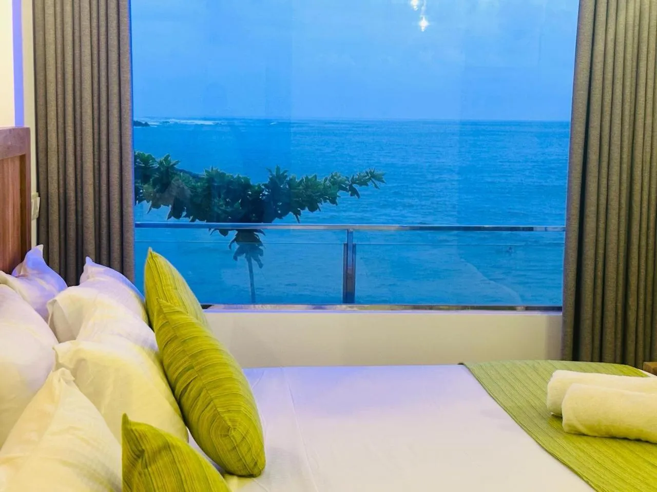 Bed in Coral Beach Hotel