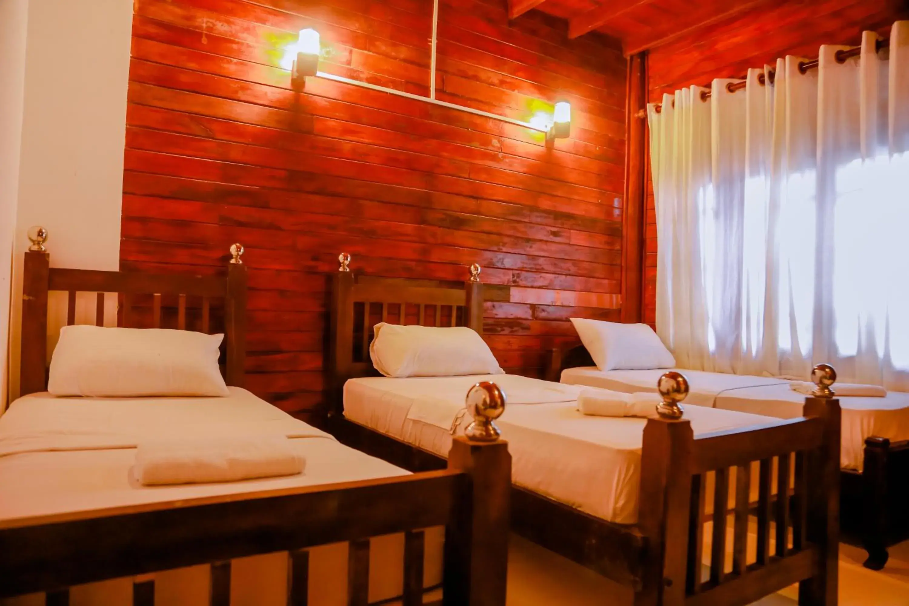 Deluxe Triple Room in Coral Beach Hotel Deluxe Triple Room in Coral Beach Hotel