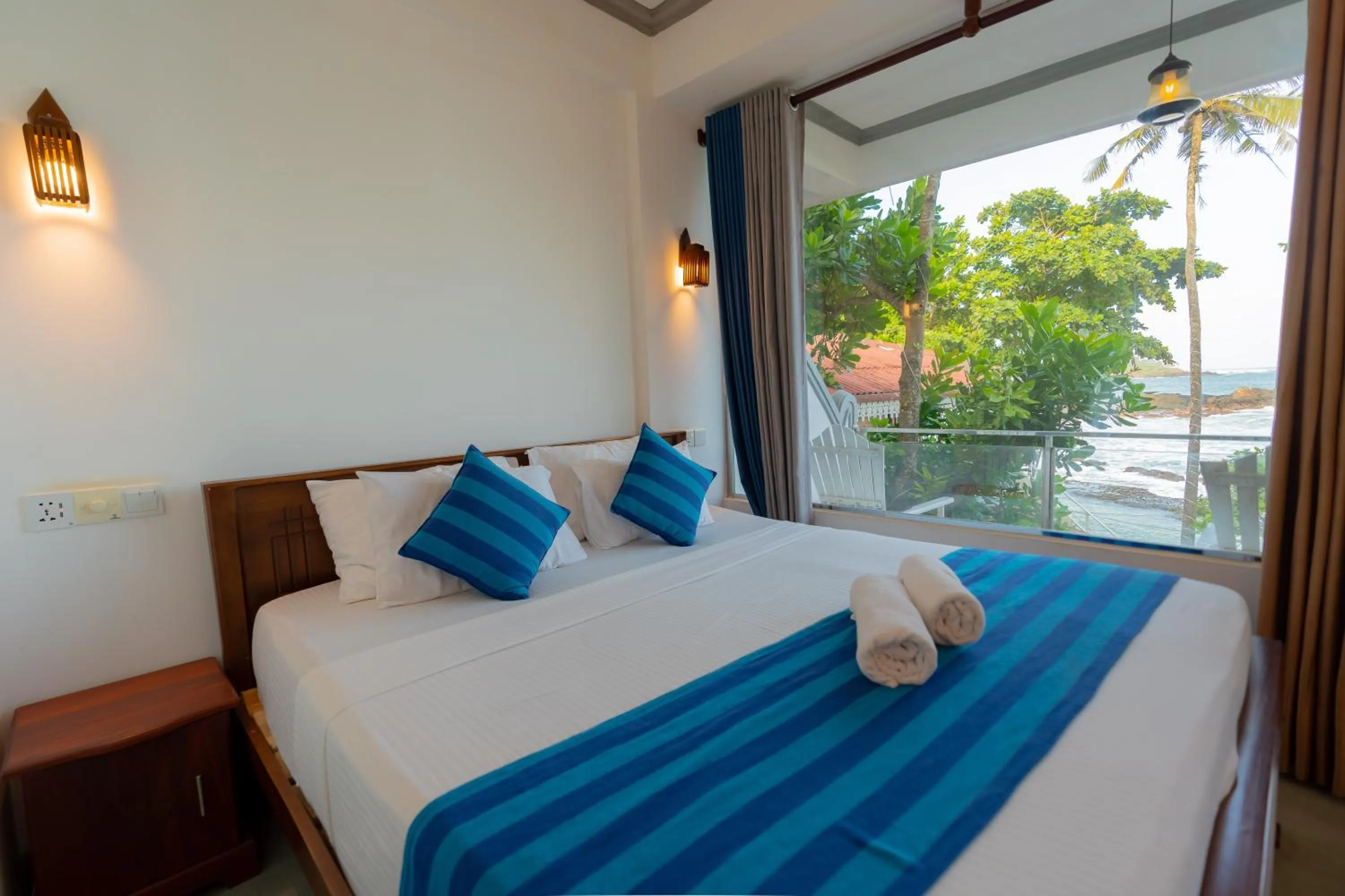 Bed in Coral Beach Hotel