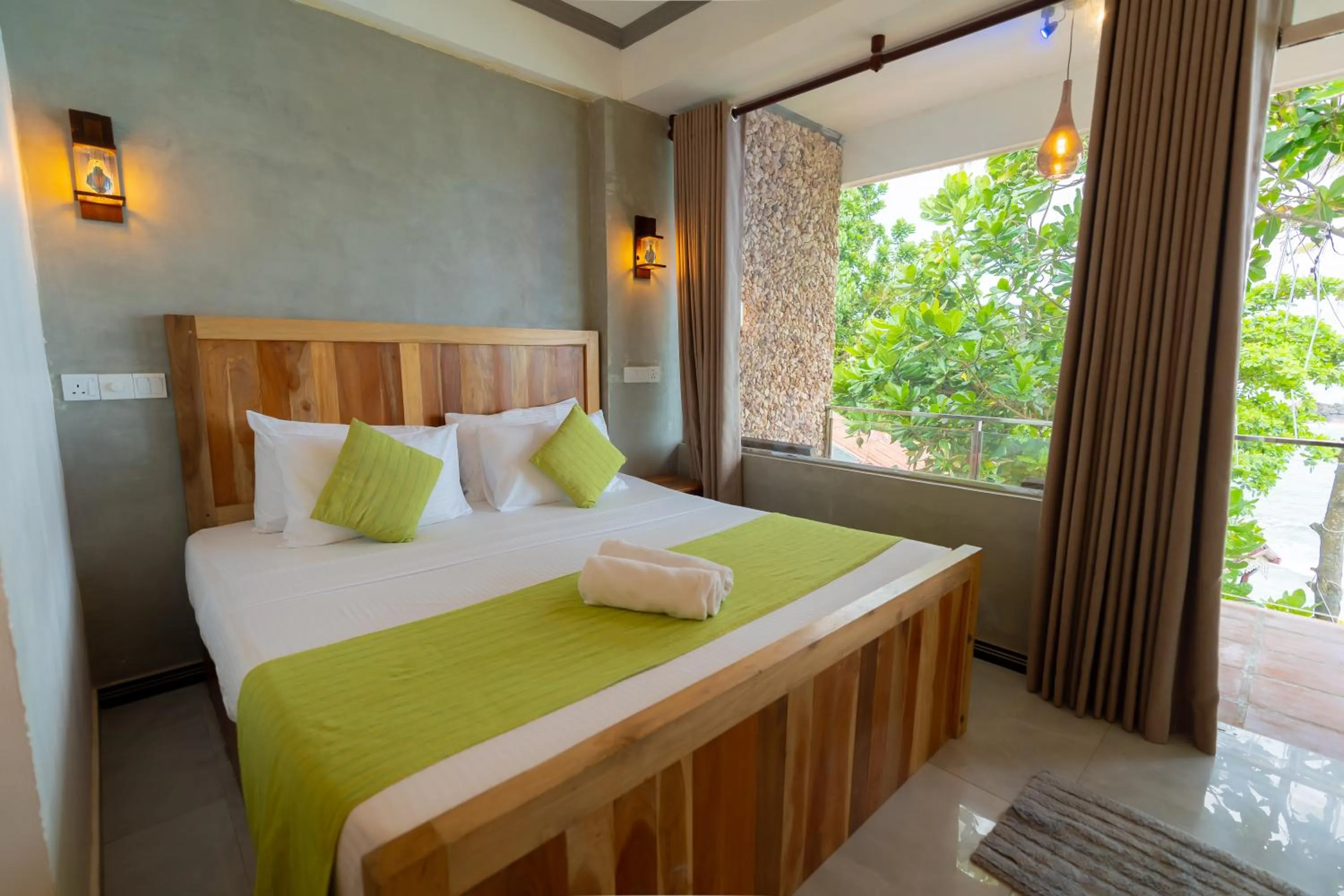 Bed in Coral Beach Hotel