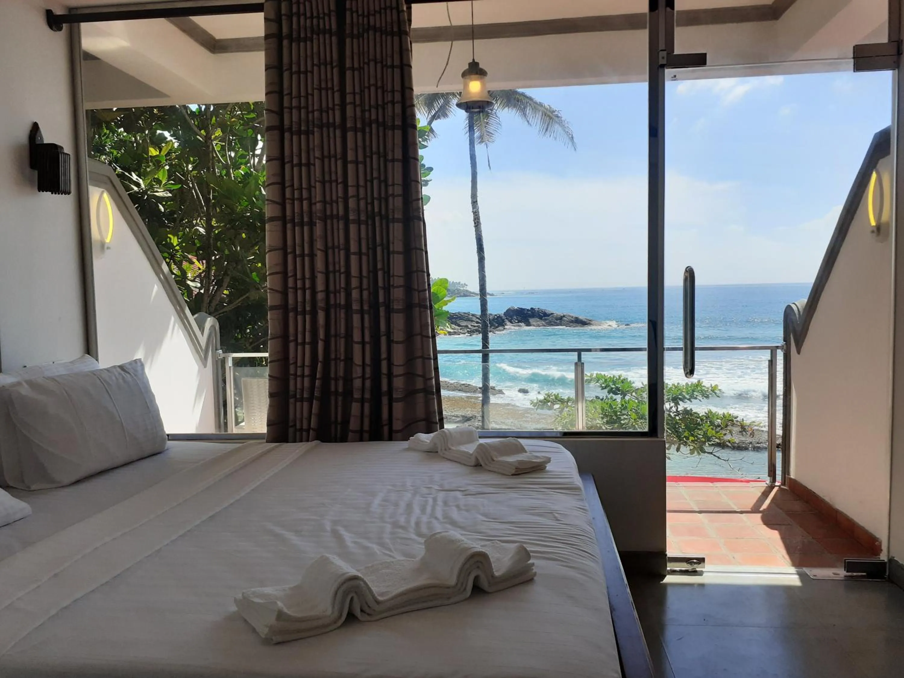 Bed in Coral Beach Hotel