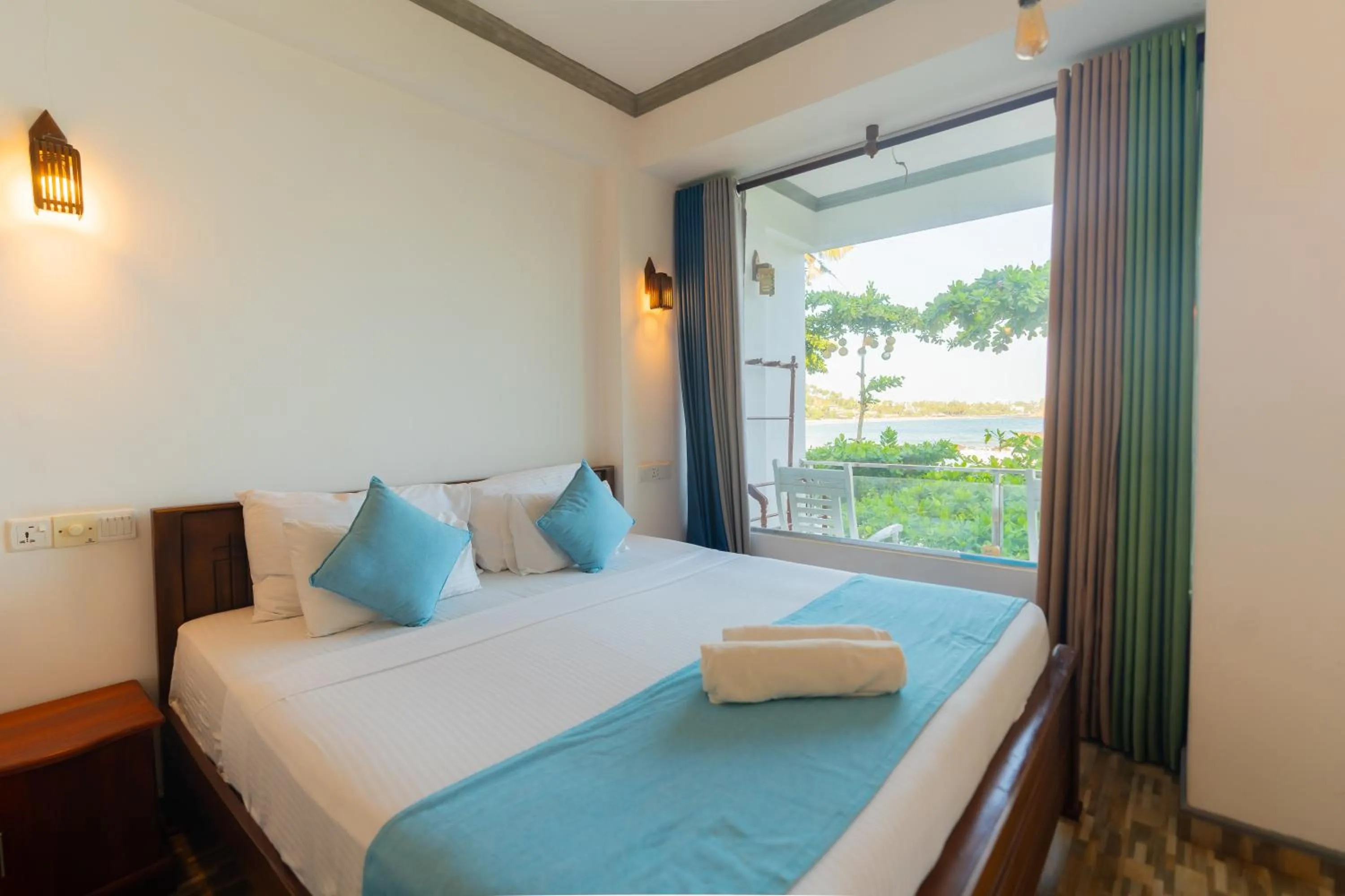 Bed in Coral Beach Hotel