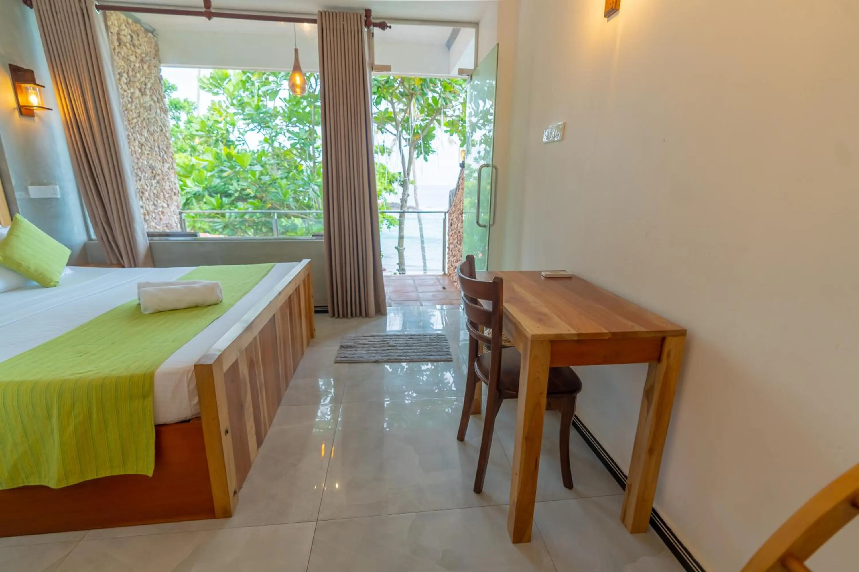 Bed in Coral Beach Hotel