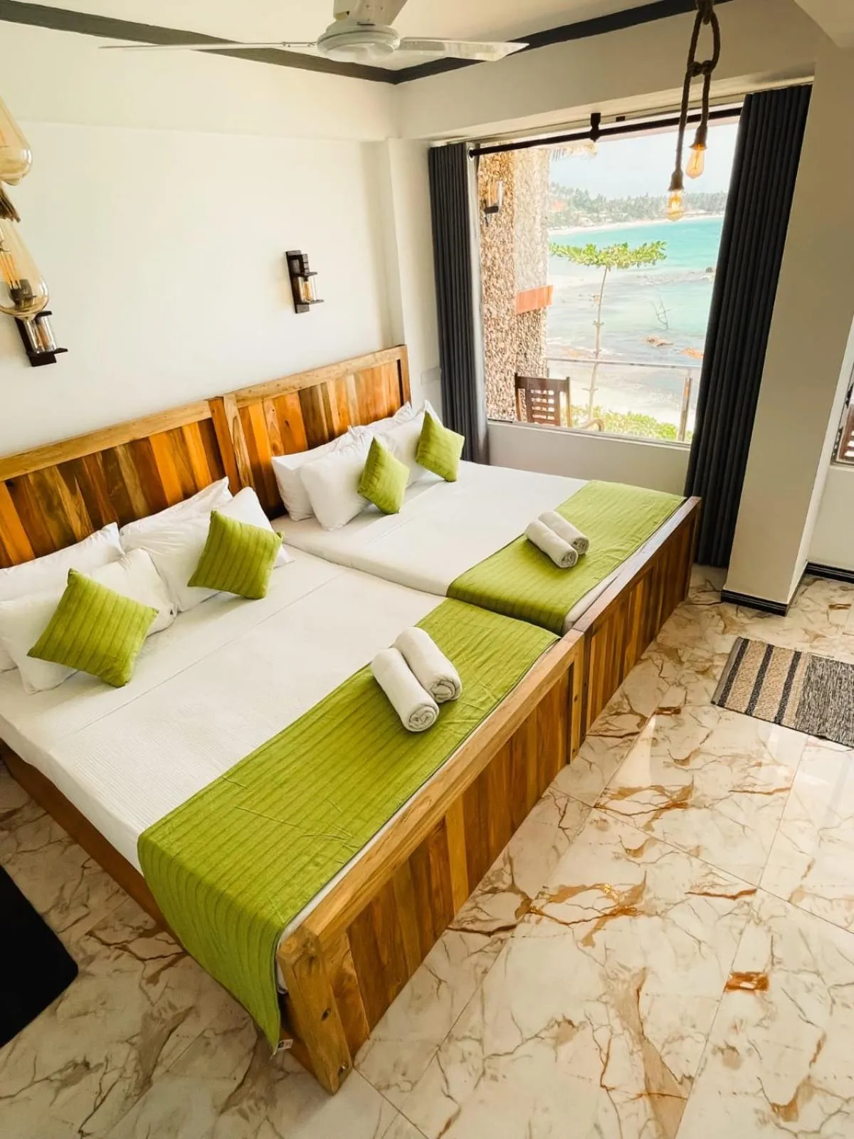 Bed in Coral Beach Hotel