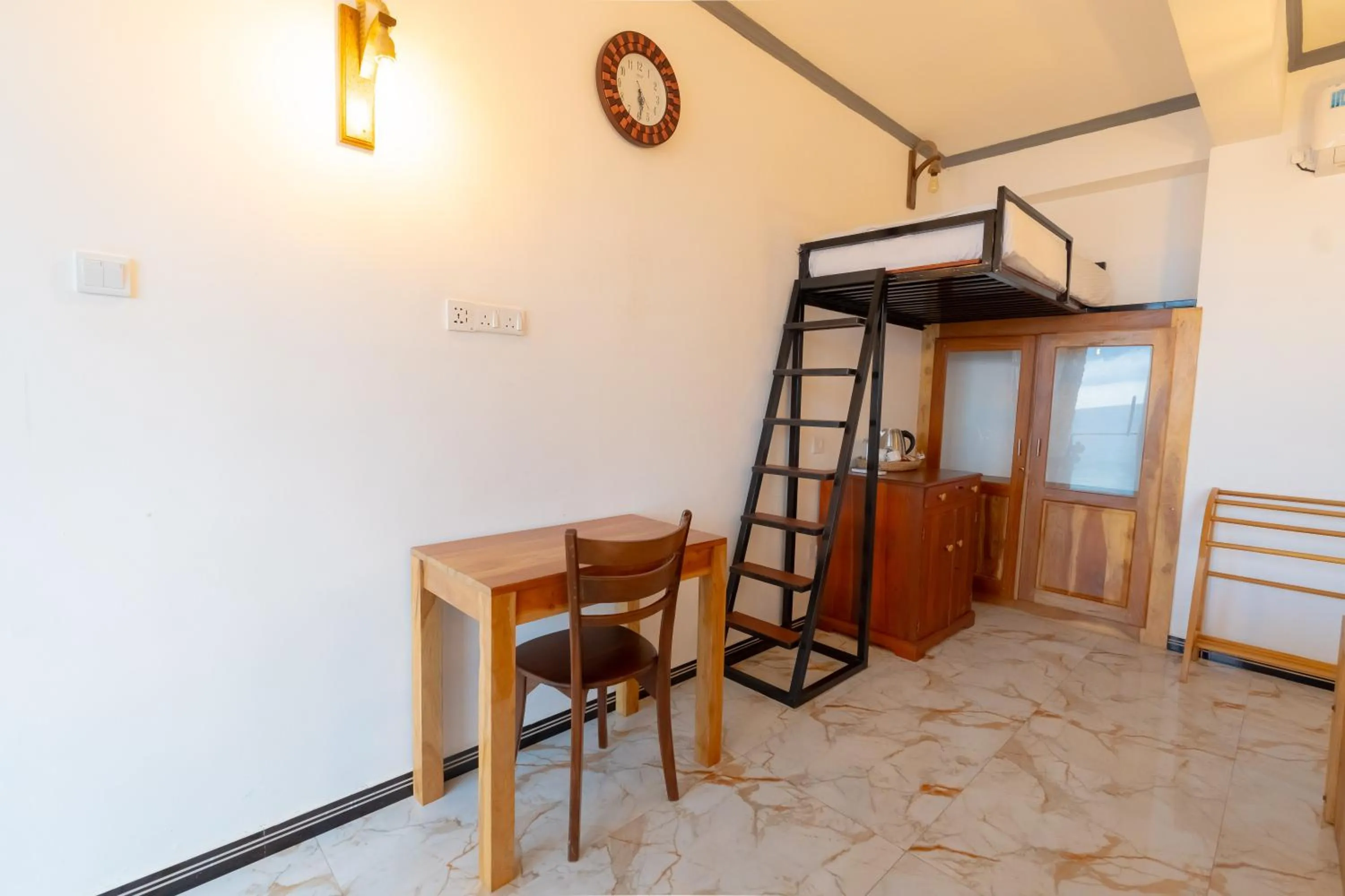 Bed in Coral Beach Hotel