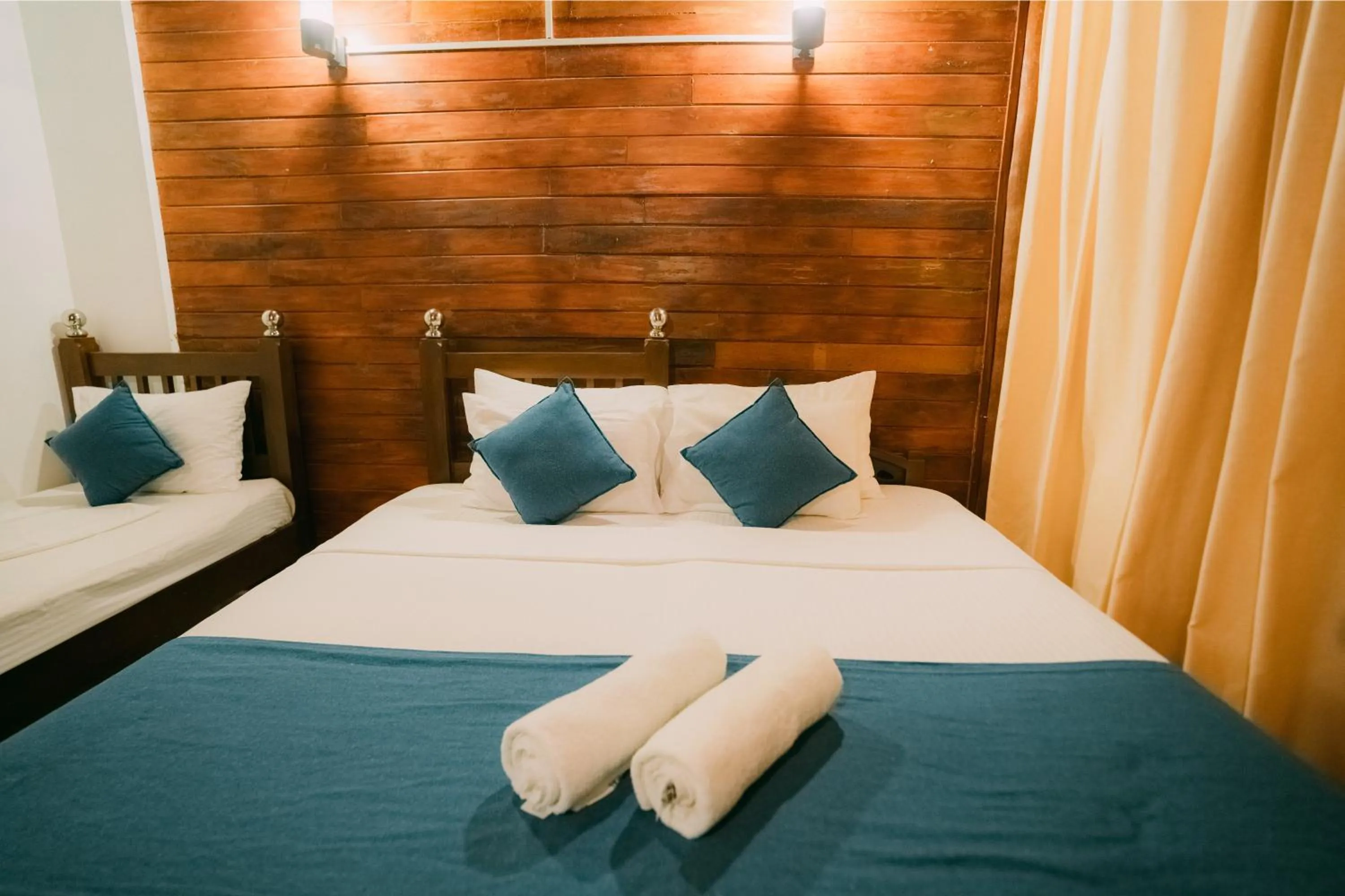 Bed in Coral Beach Hotel