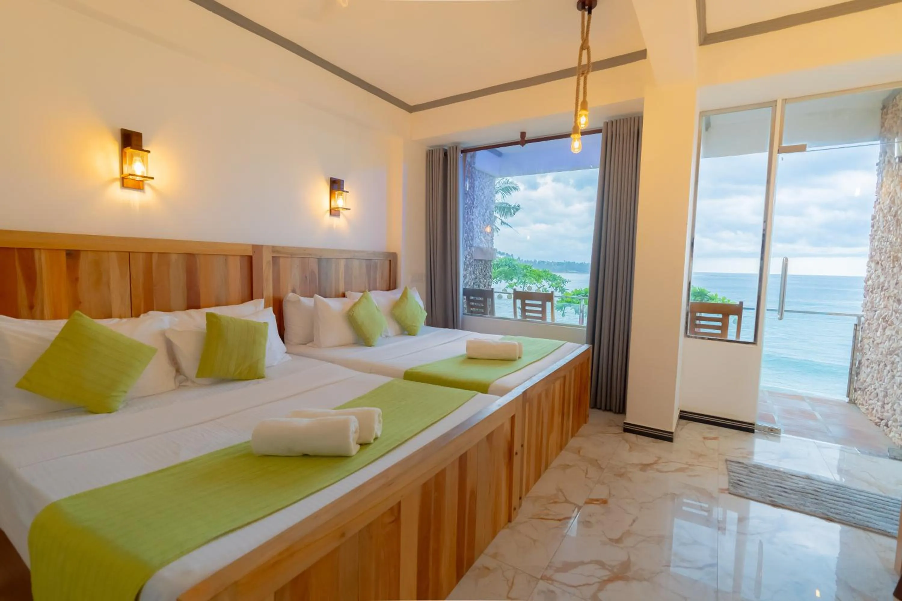 Bed in Coral Beach Hotel
