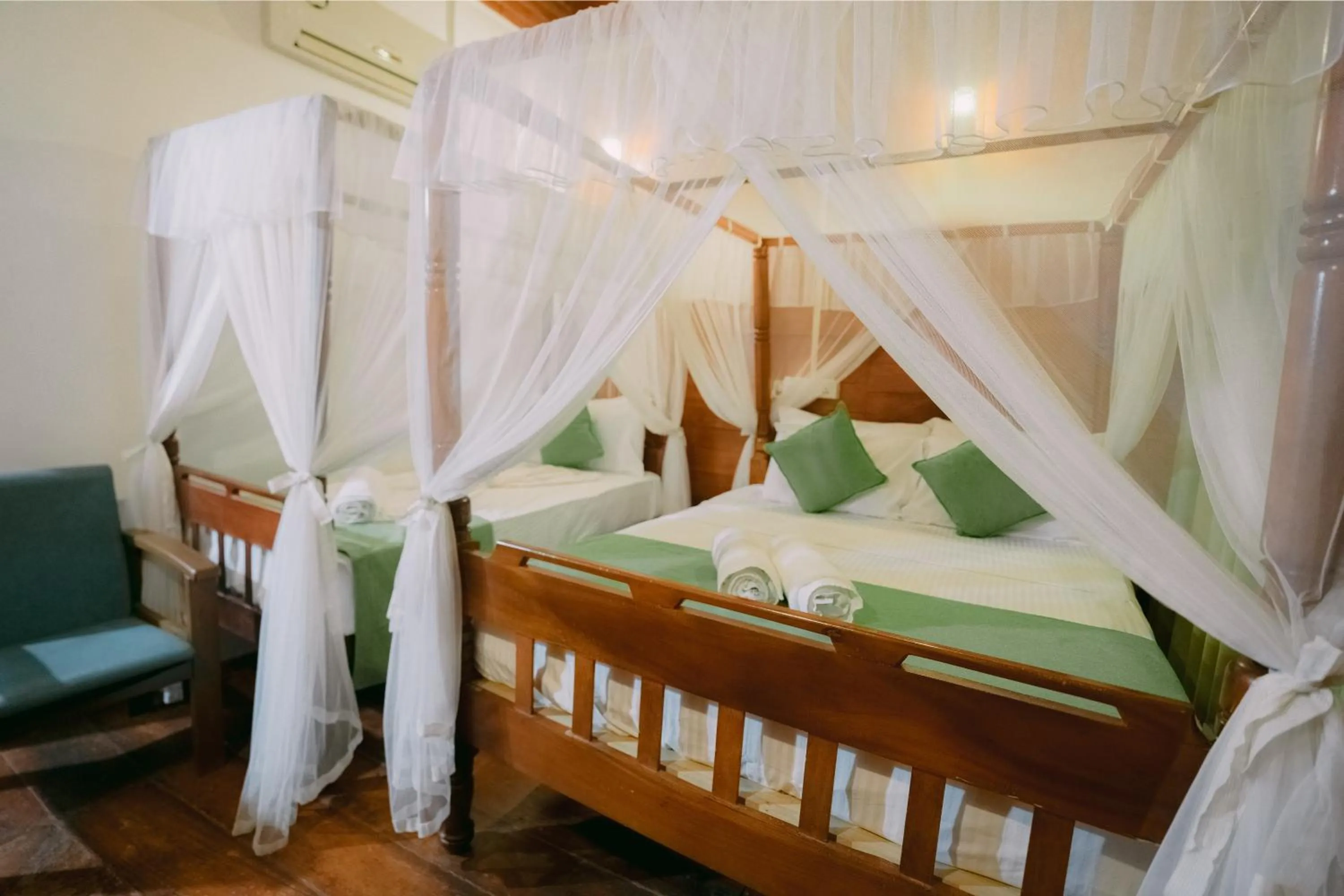 Bed in Coral Beach Hotel