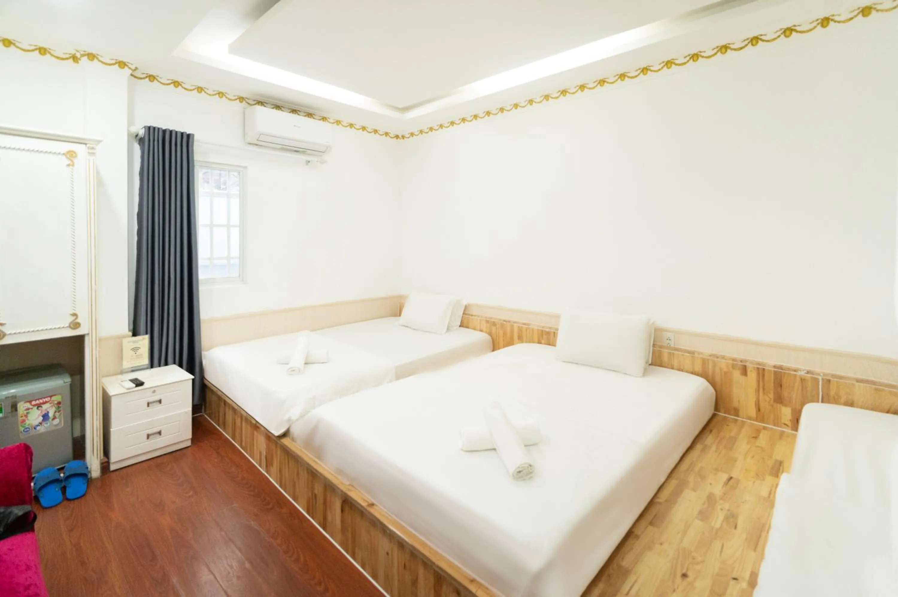 Bed in CROWNE BUI VIEN Hotel