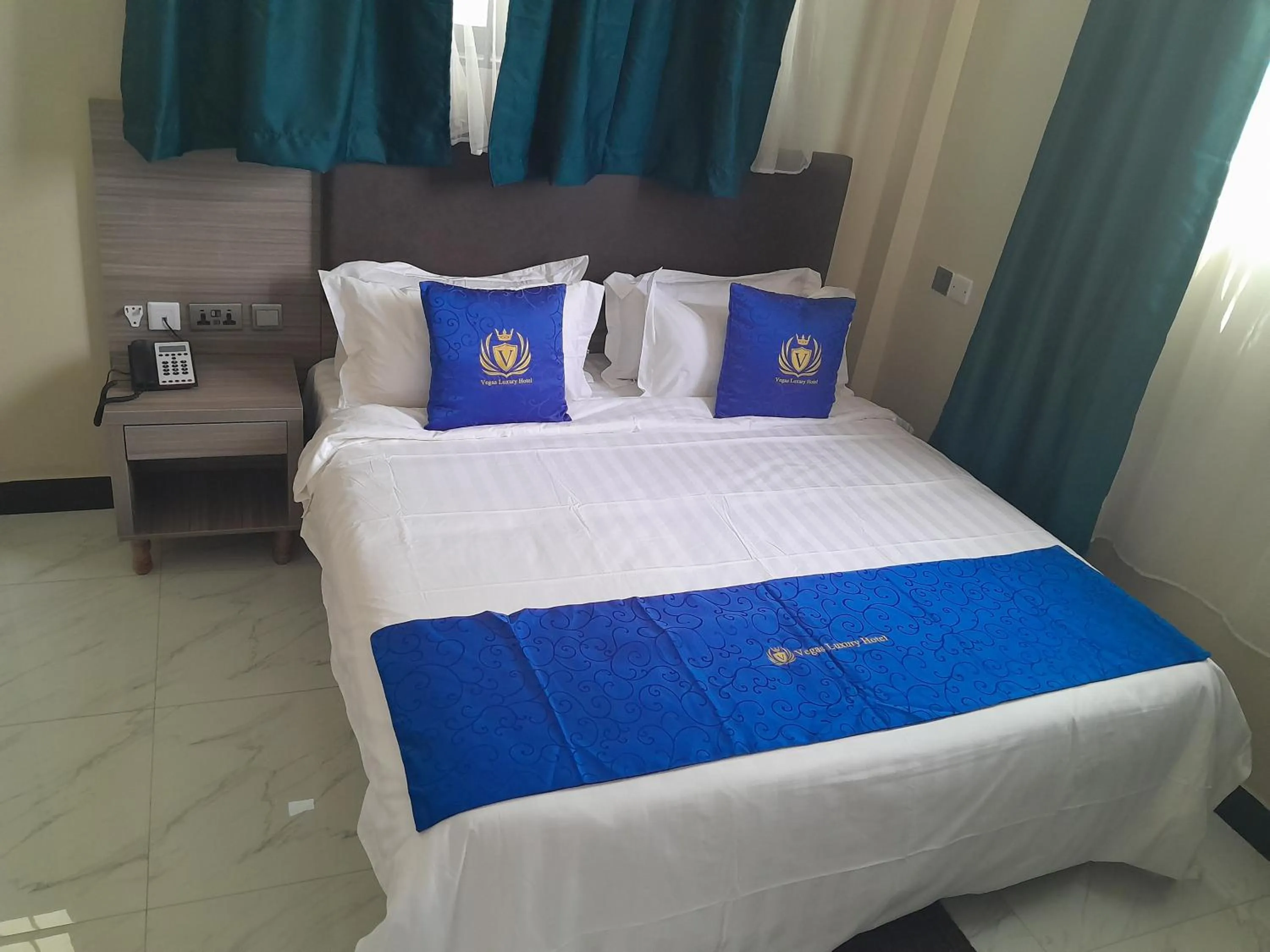 Bed in VEGAS LUXURY HOTEL