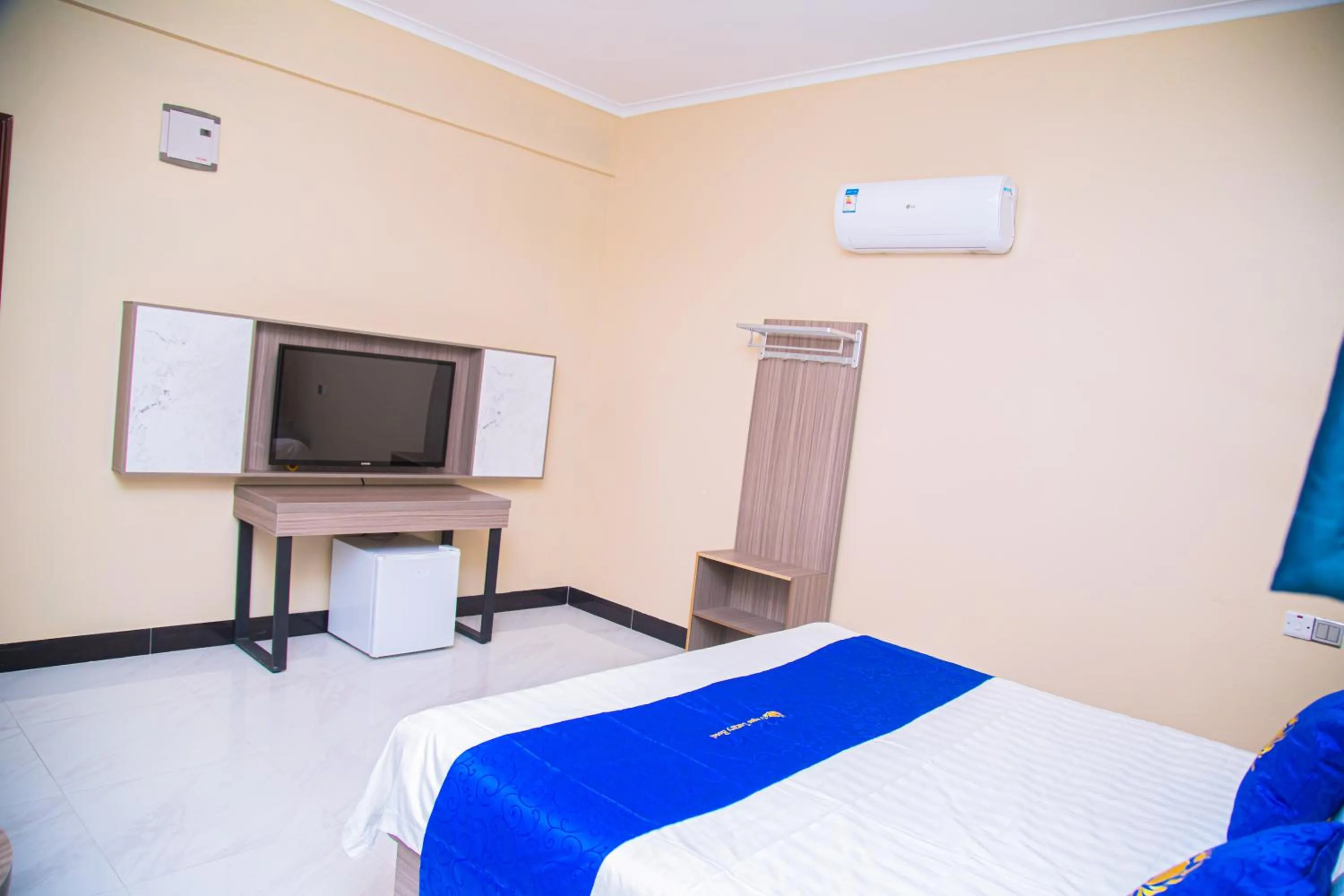 Communal lounge/ TV room, Bed in VEGAS LUXURY HOTEL