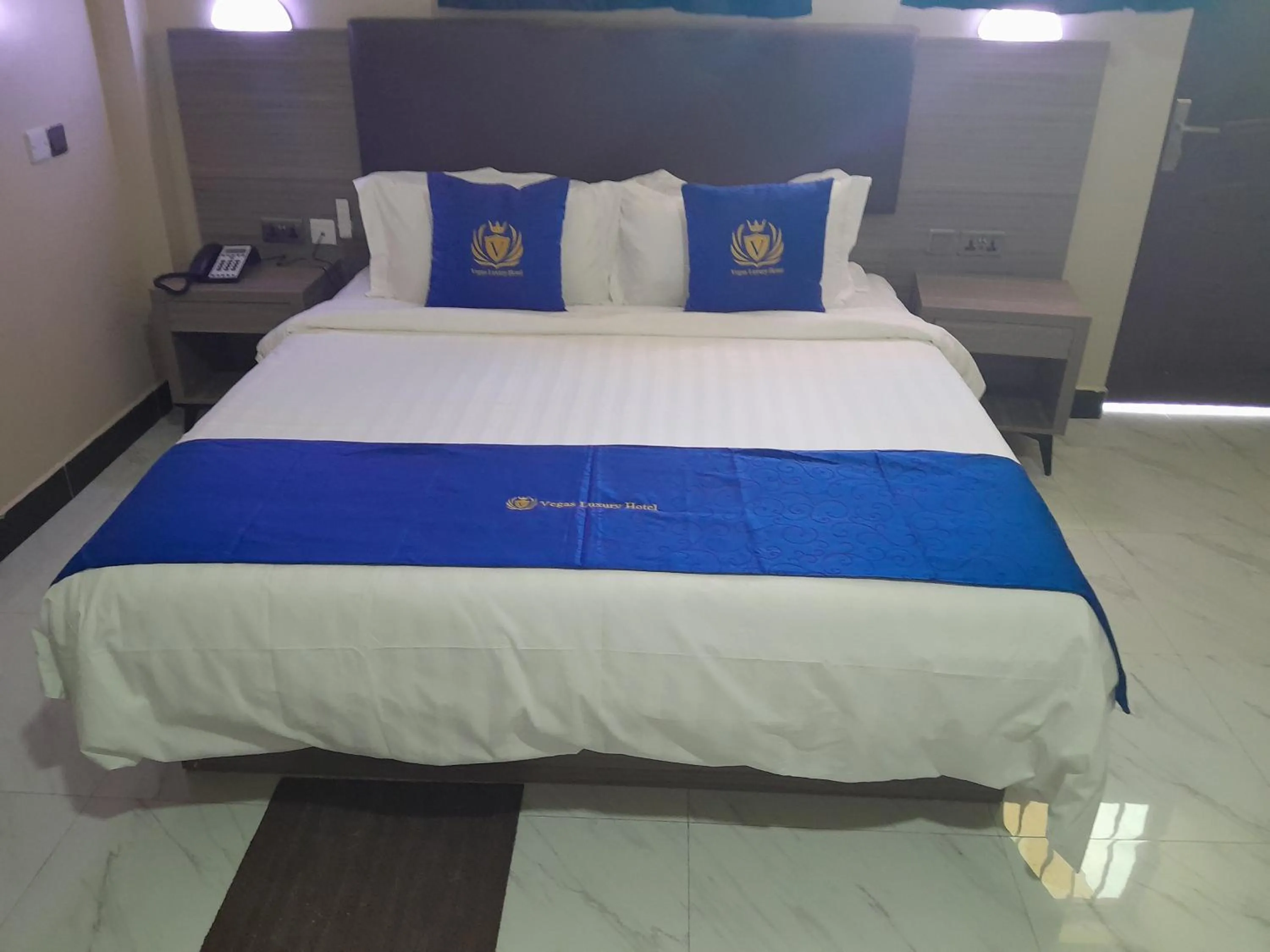 Bed in VEGAS LUXURY HOTEL