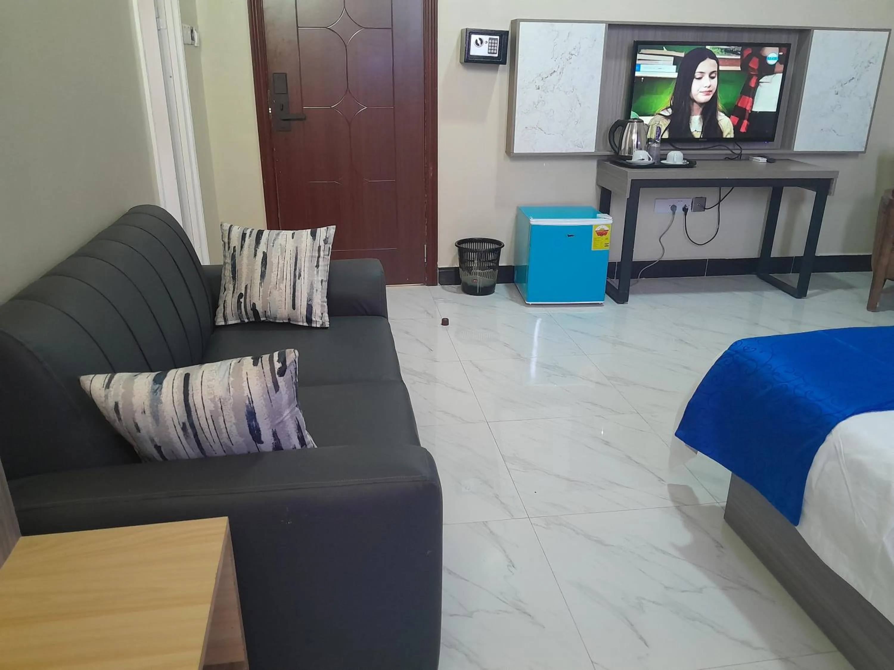 Communal lounge/ TV room in VEGAS LUXURY HOTEL