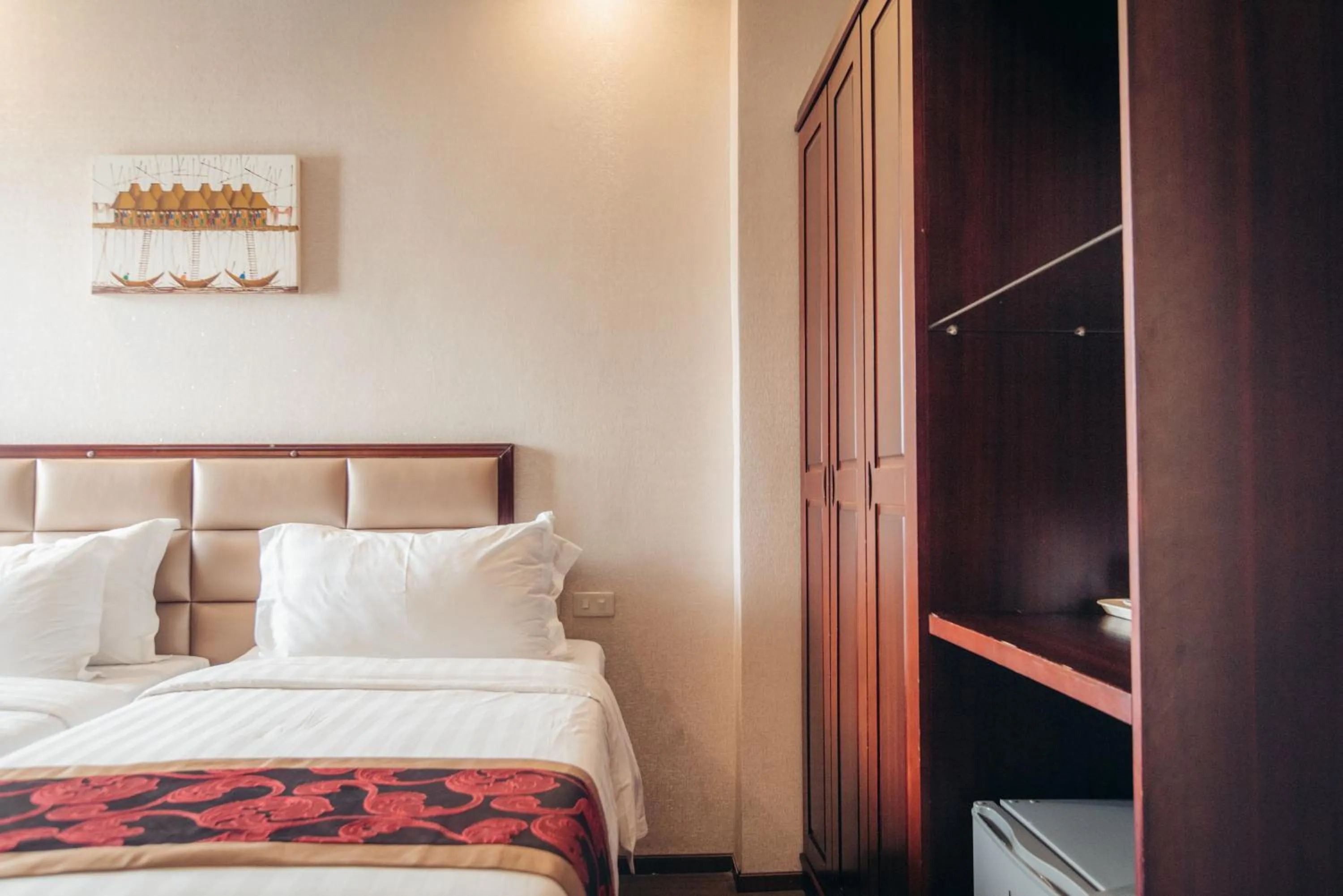 Bed in Palawan Uno Hotel