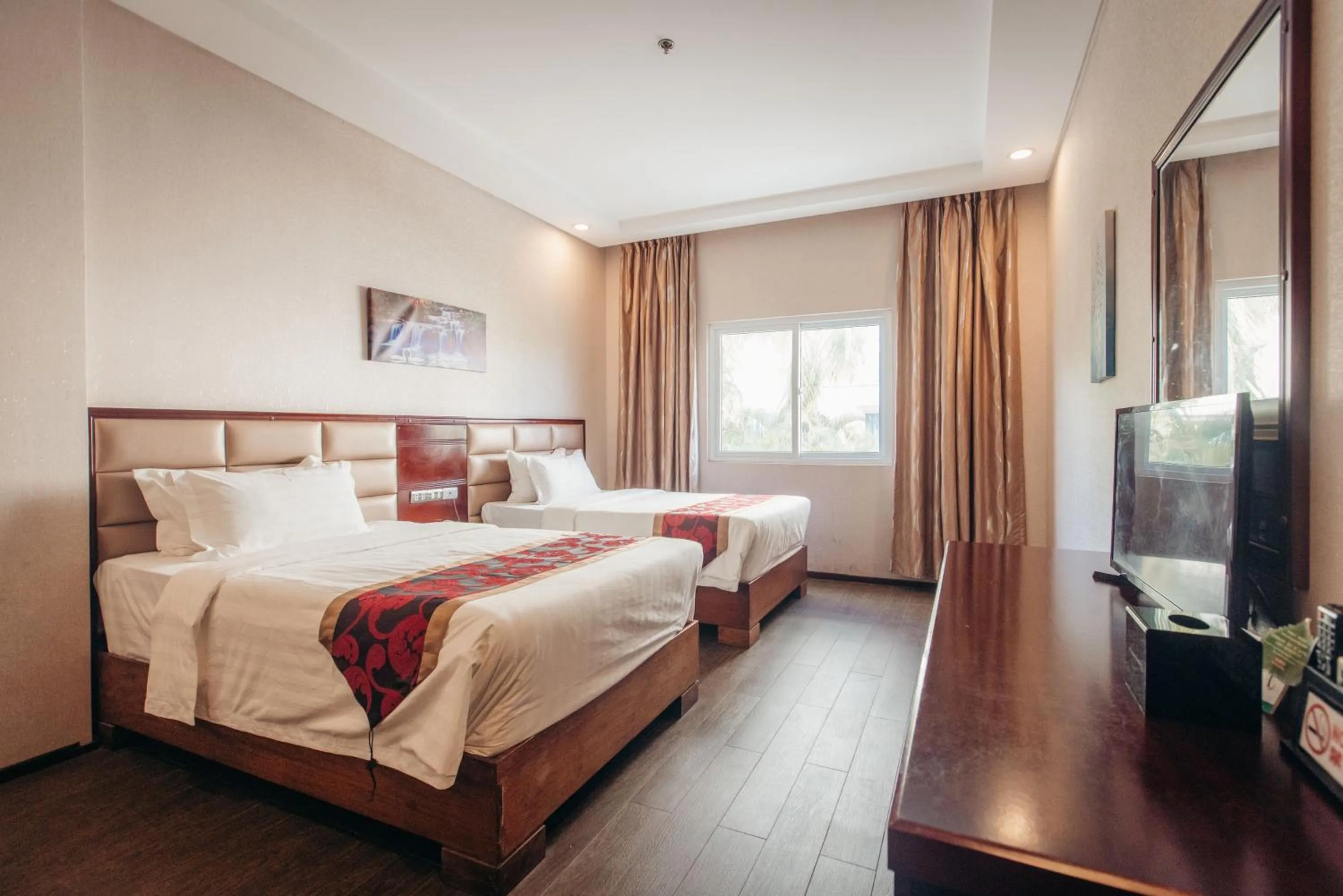 Bed in Palawan Uno Hotel