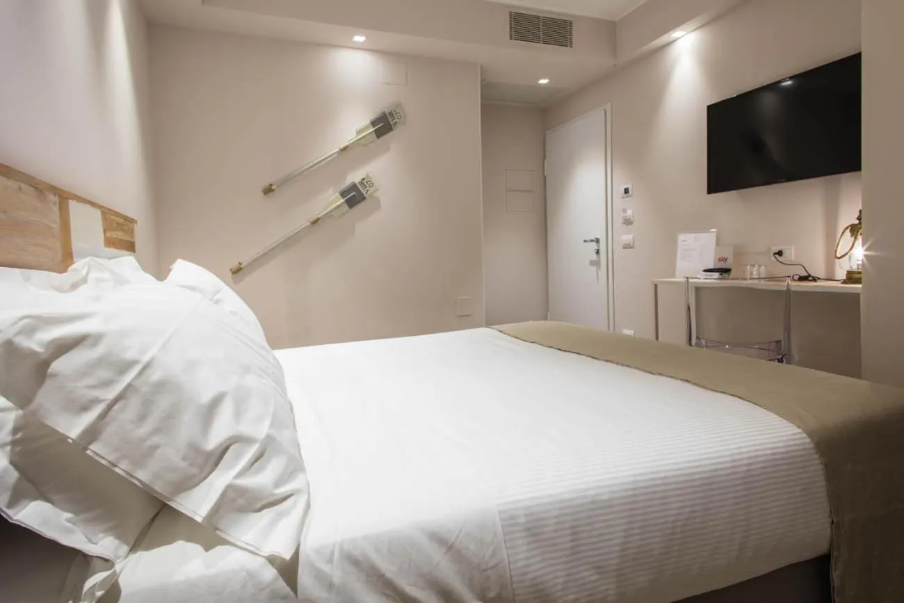 Bed in Manè Boutique Hotel