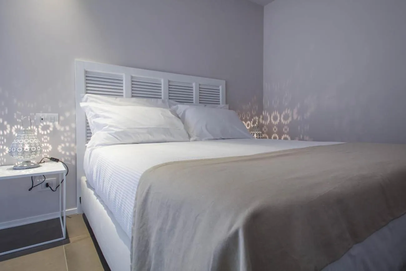 Bed in Manè Boutique Hotel