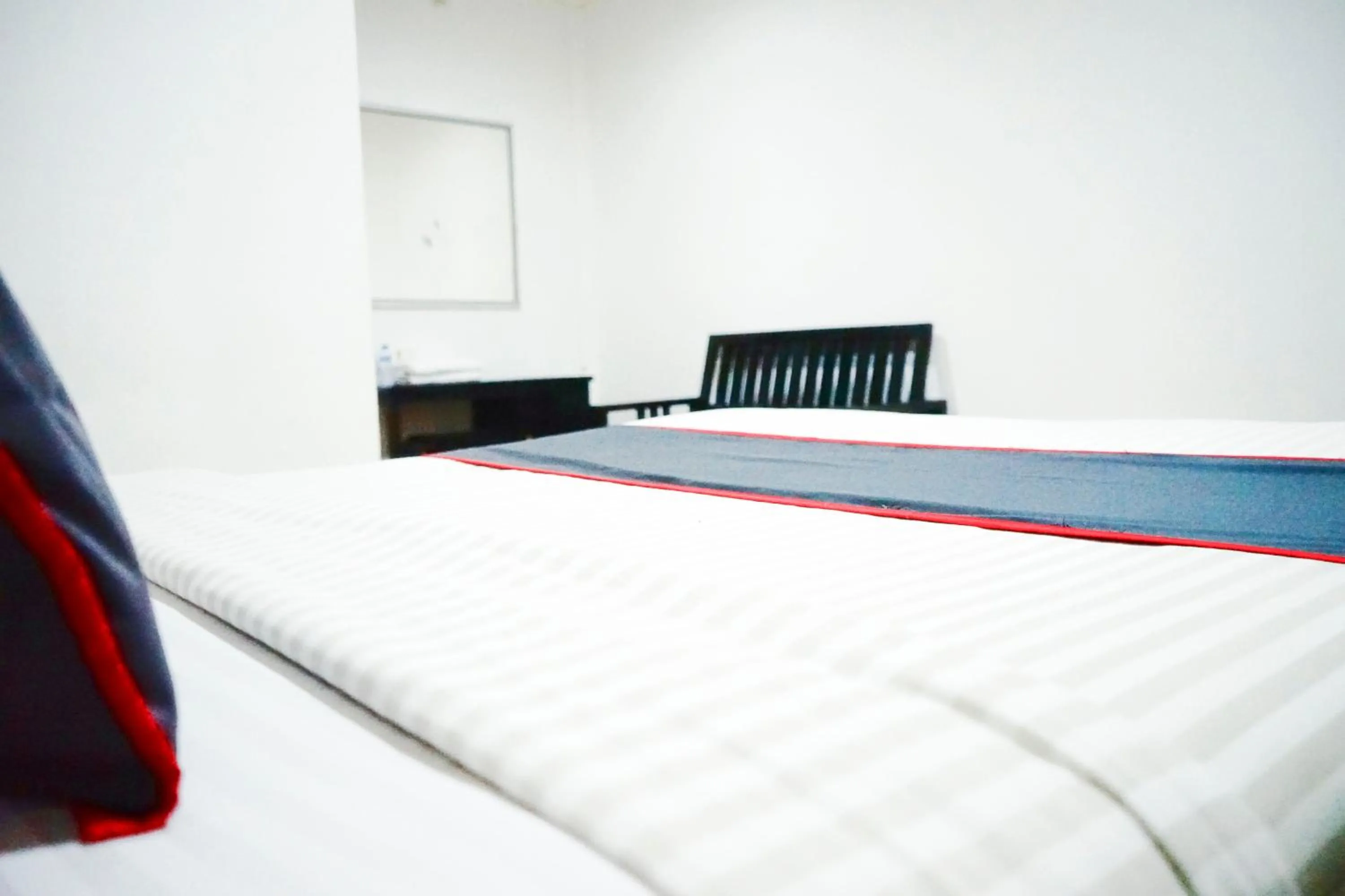 Bedroom in Hotel O Padang City Center Near Pantai Padang Formerly Hotel Siti Nurbaya