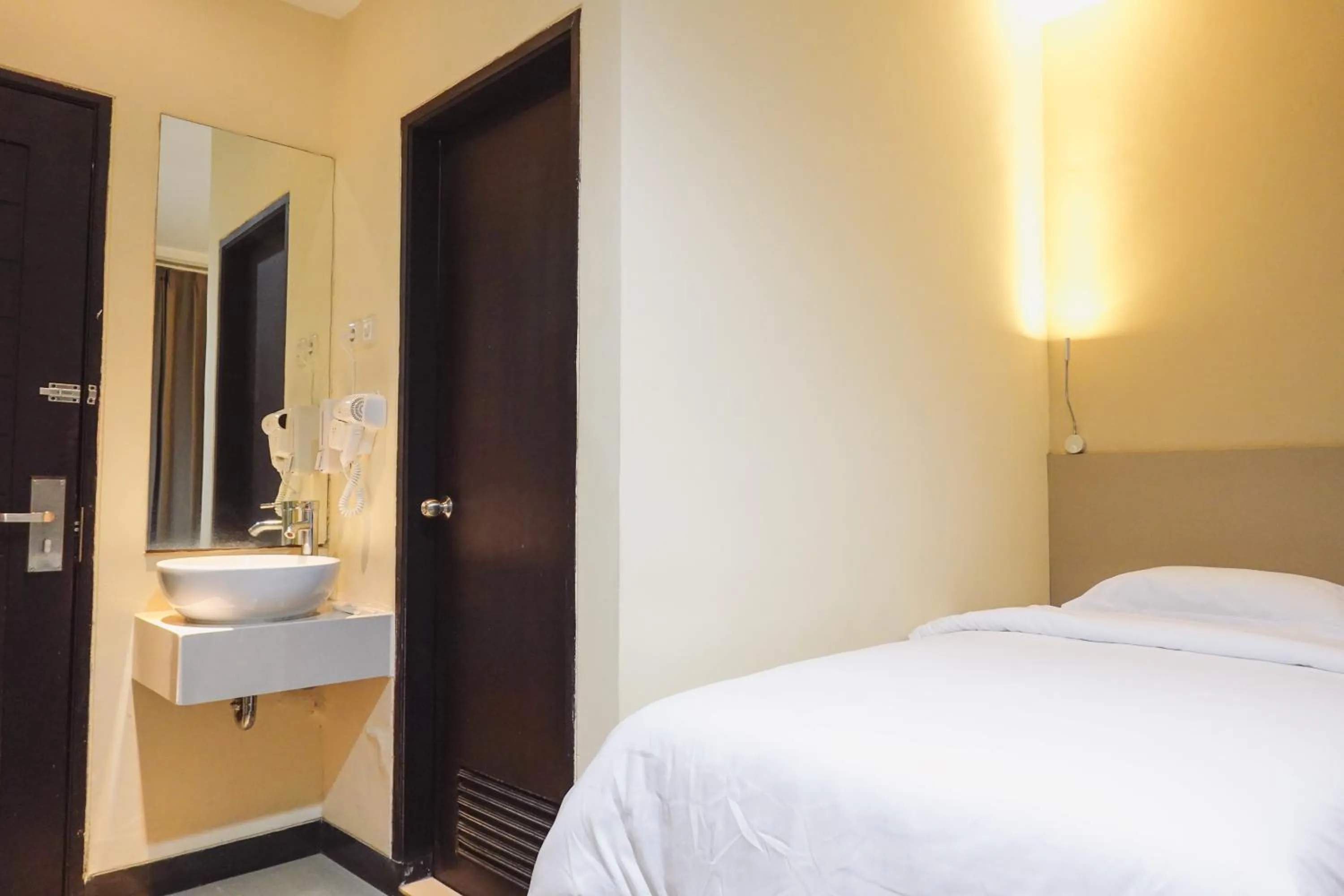 Bed in City Hotel Mataram