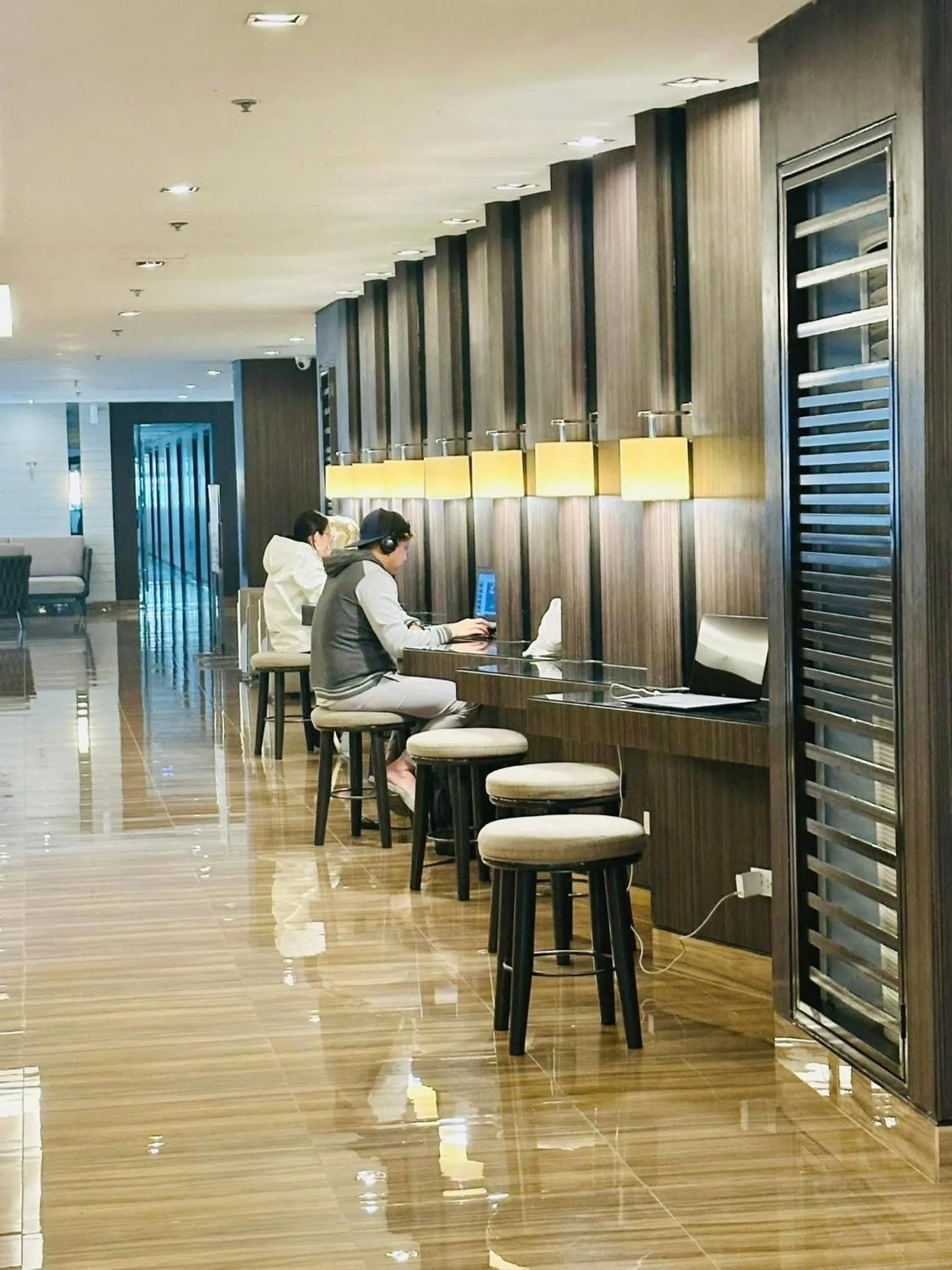 Seating area in E & T Homecations 2 Bedroom Apartment at SMDC Air Residences