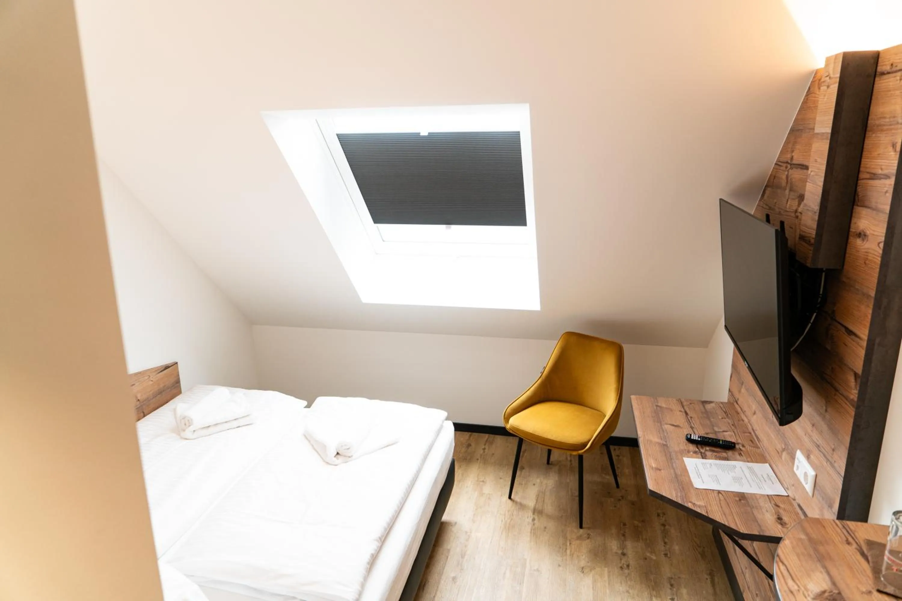 Bed in SEKRA Stadthotel