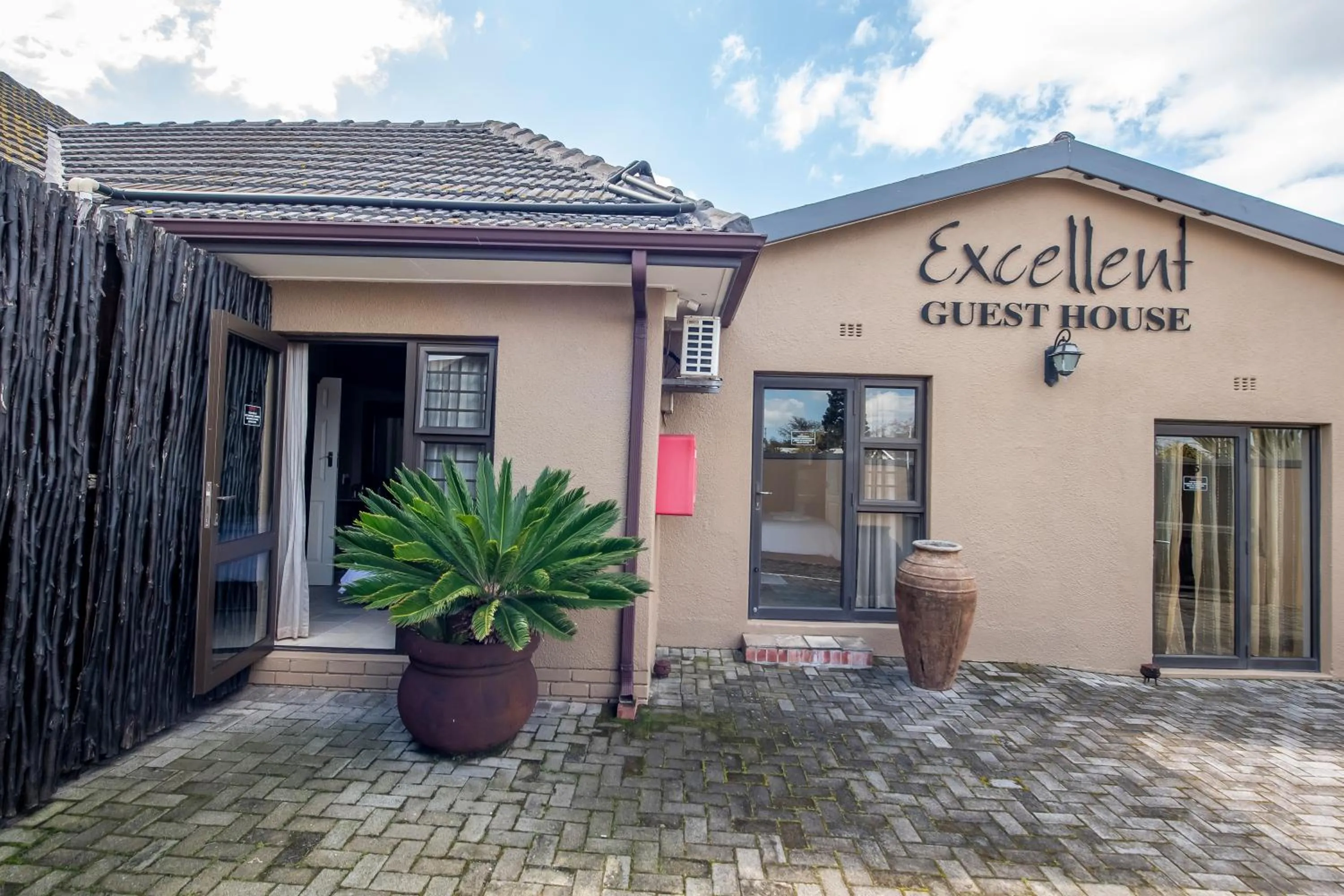 Property building in Excellent Guest House