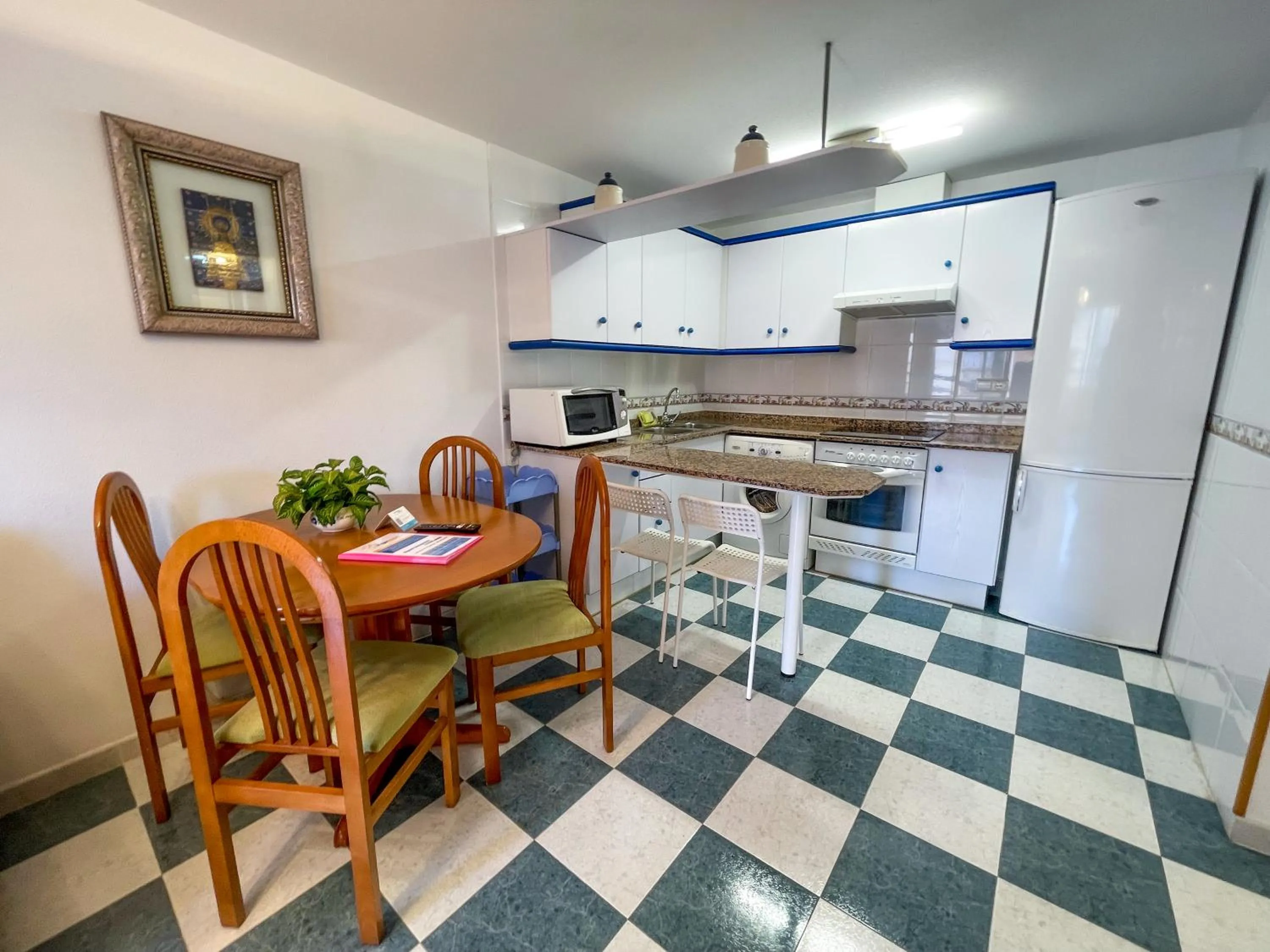 Kitchen or kitchenette in Apartamentos Bonaire 3000