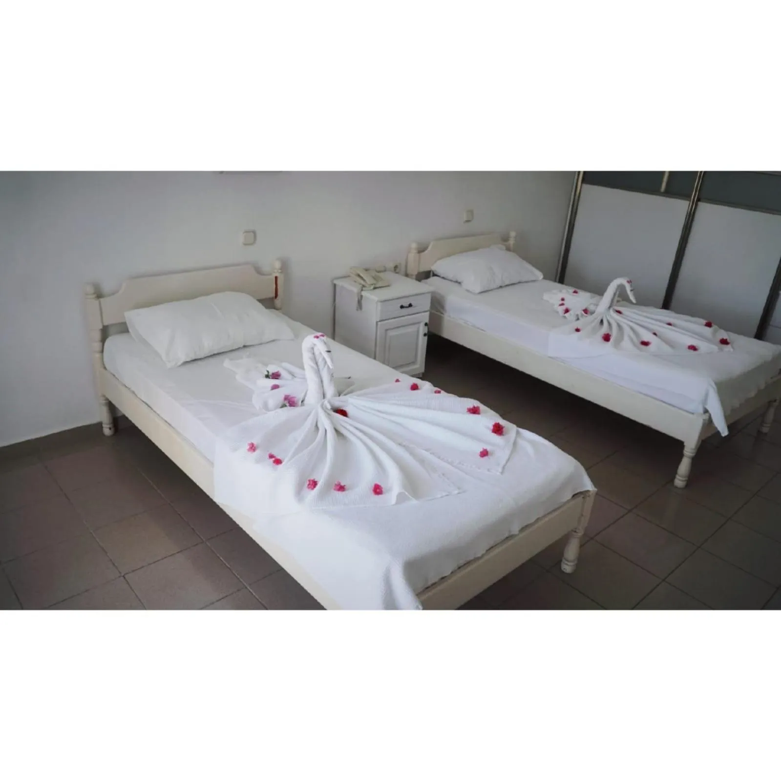 Bed in Gumbet Cove Hotel